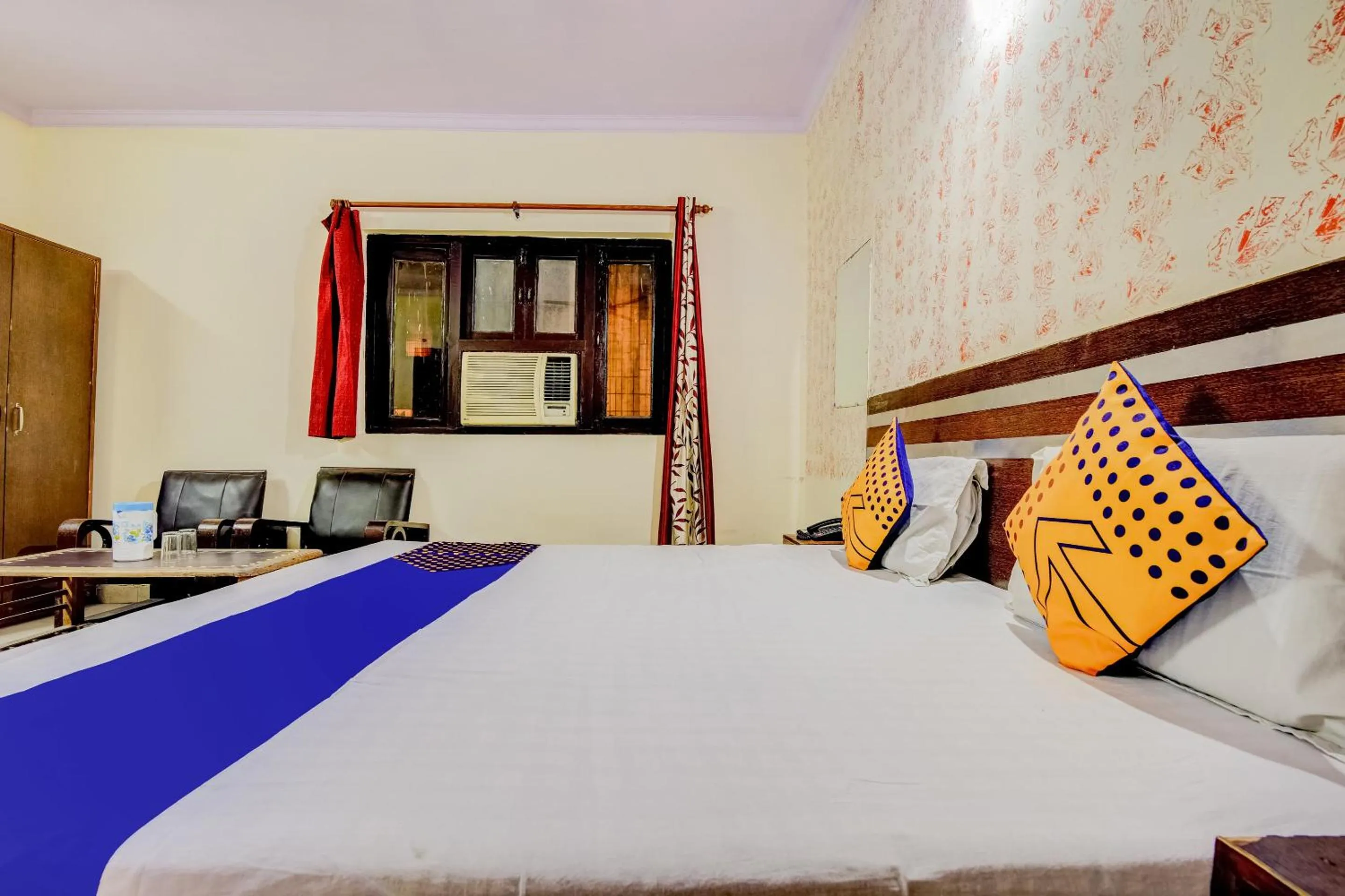 Bedroom, Bed in Spot On Swagat Palace