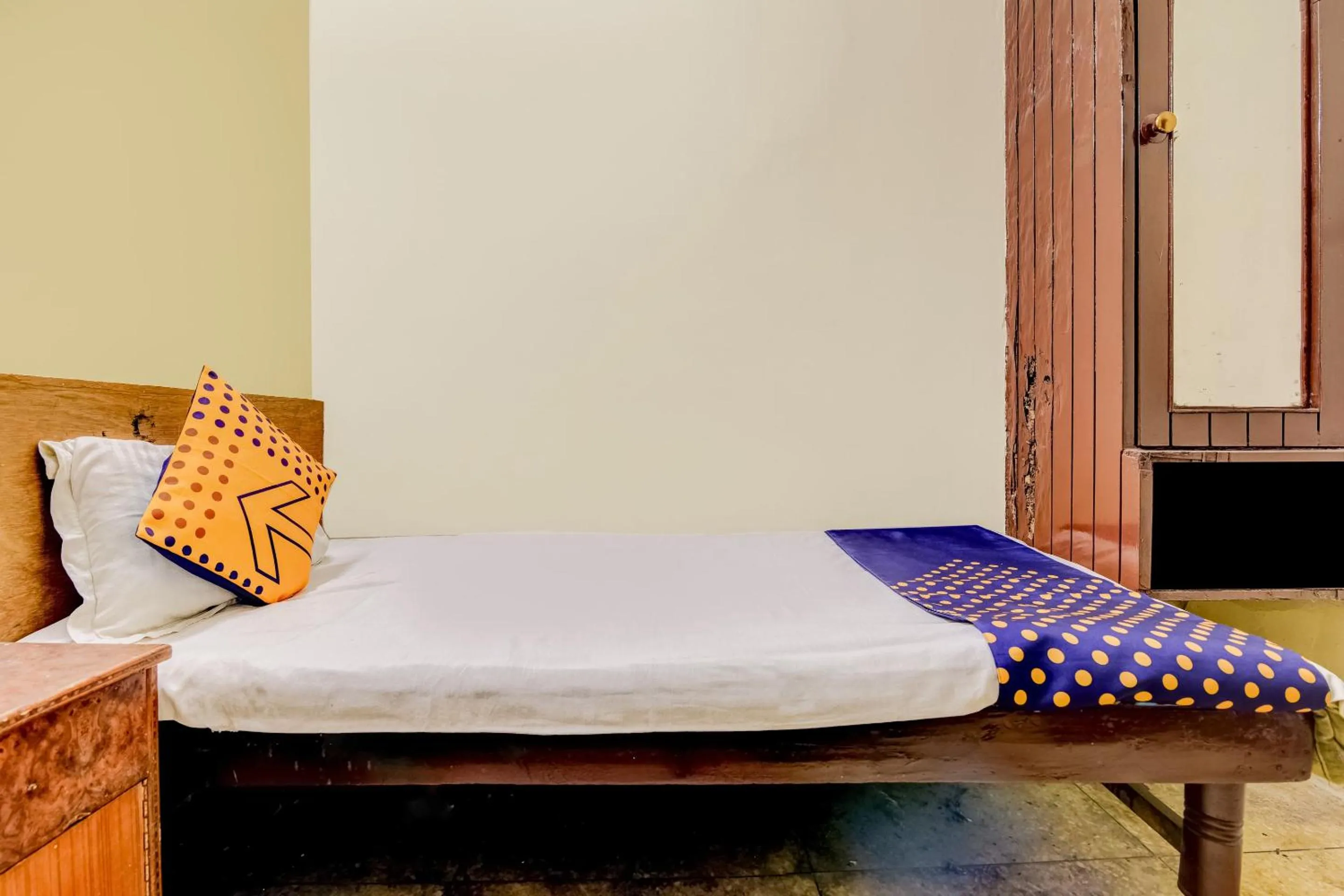 Bedroom, Bed in Spot On Swagat Palace