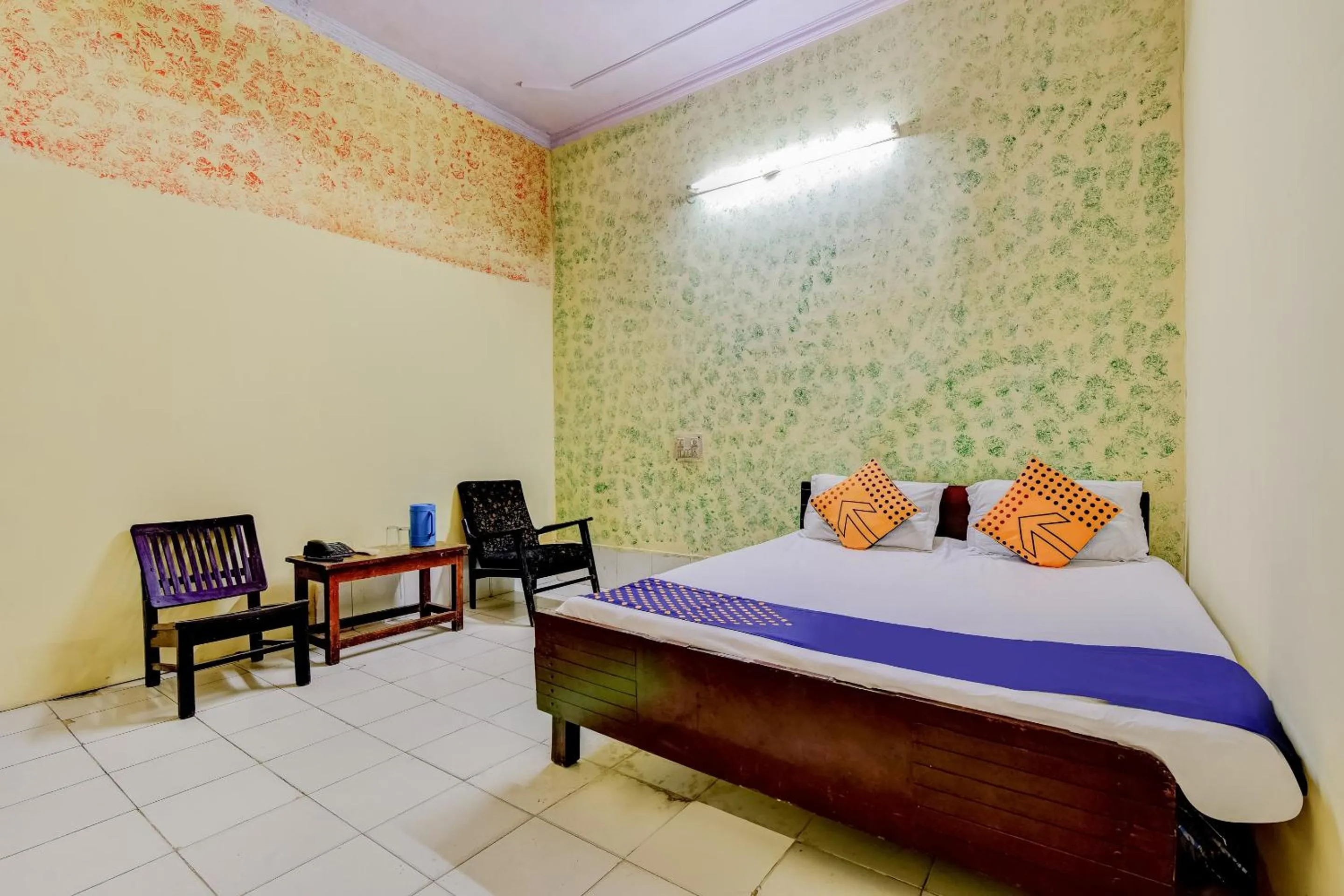 Bedroom, Bed in Spot On Swagat Palace