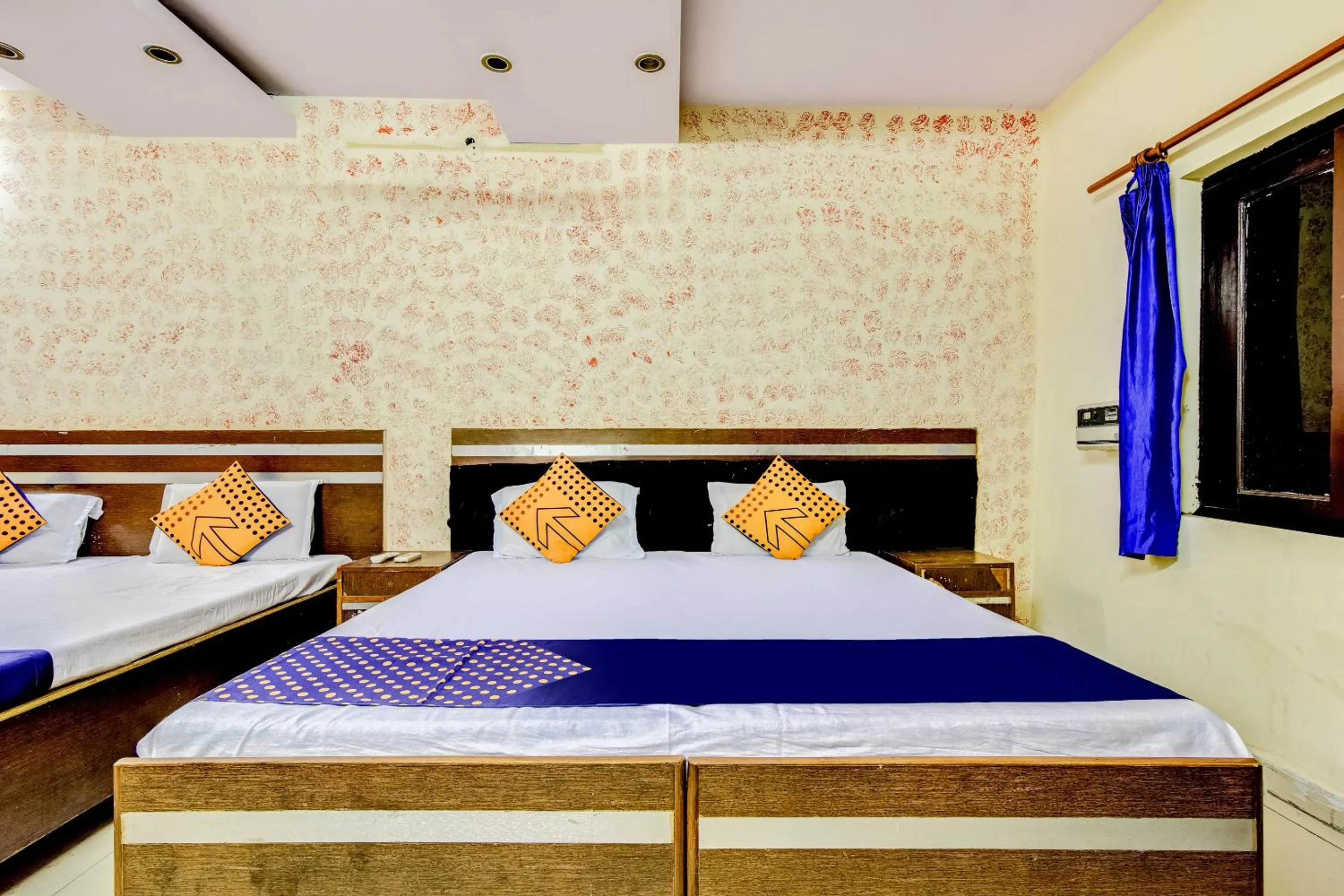 Bedroom, Bed in Spot On Swagat Palace