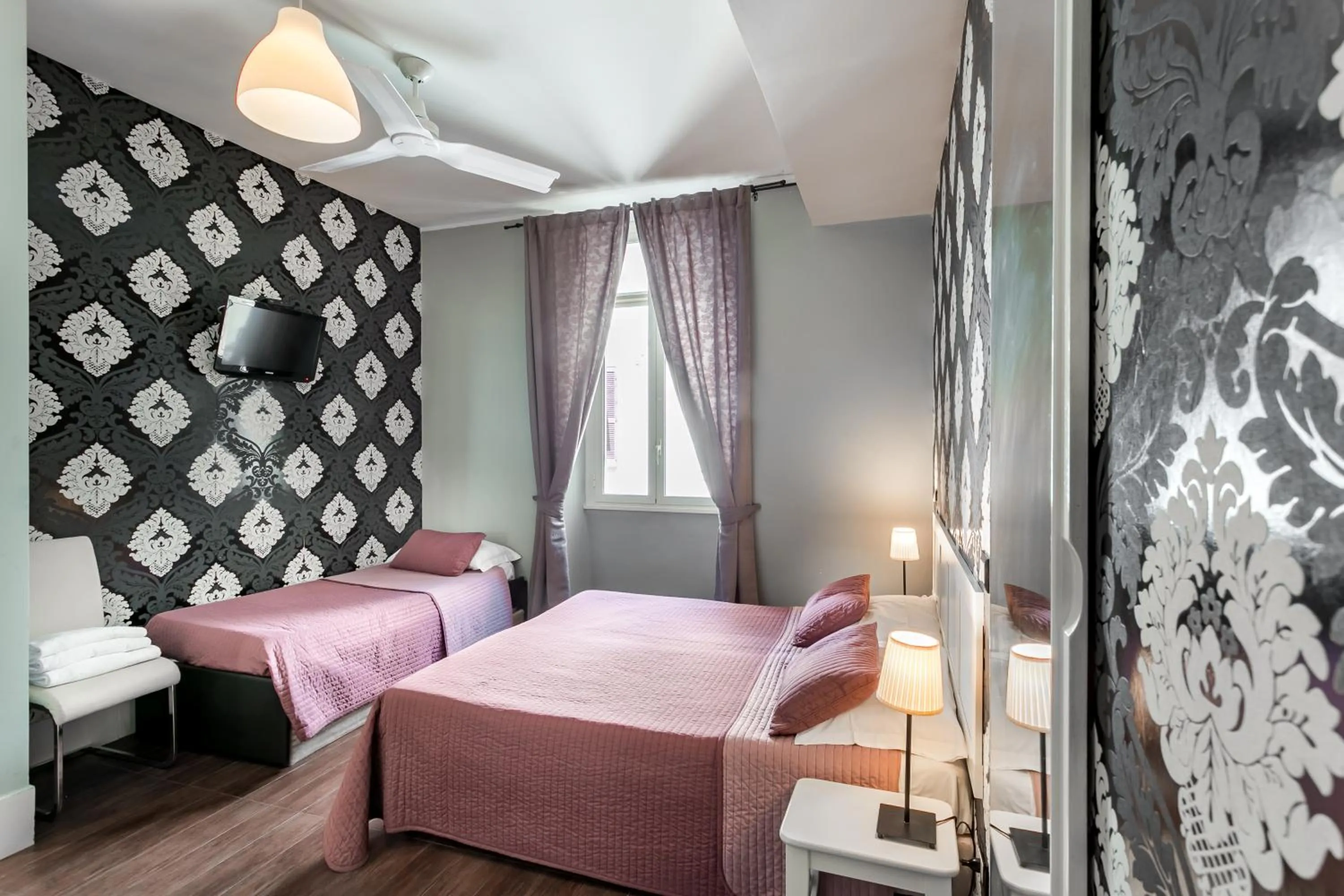 Bed in AmoRoma Suite