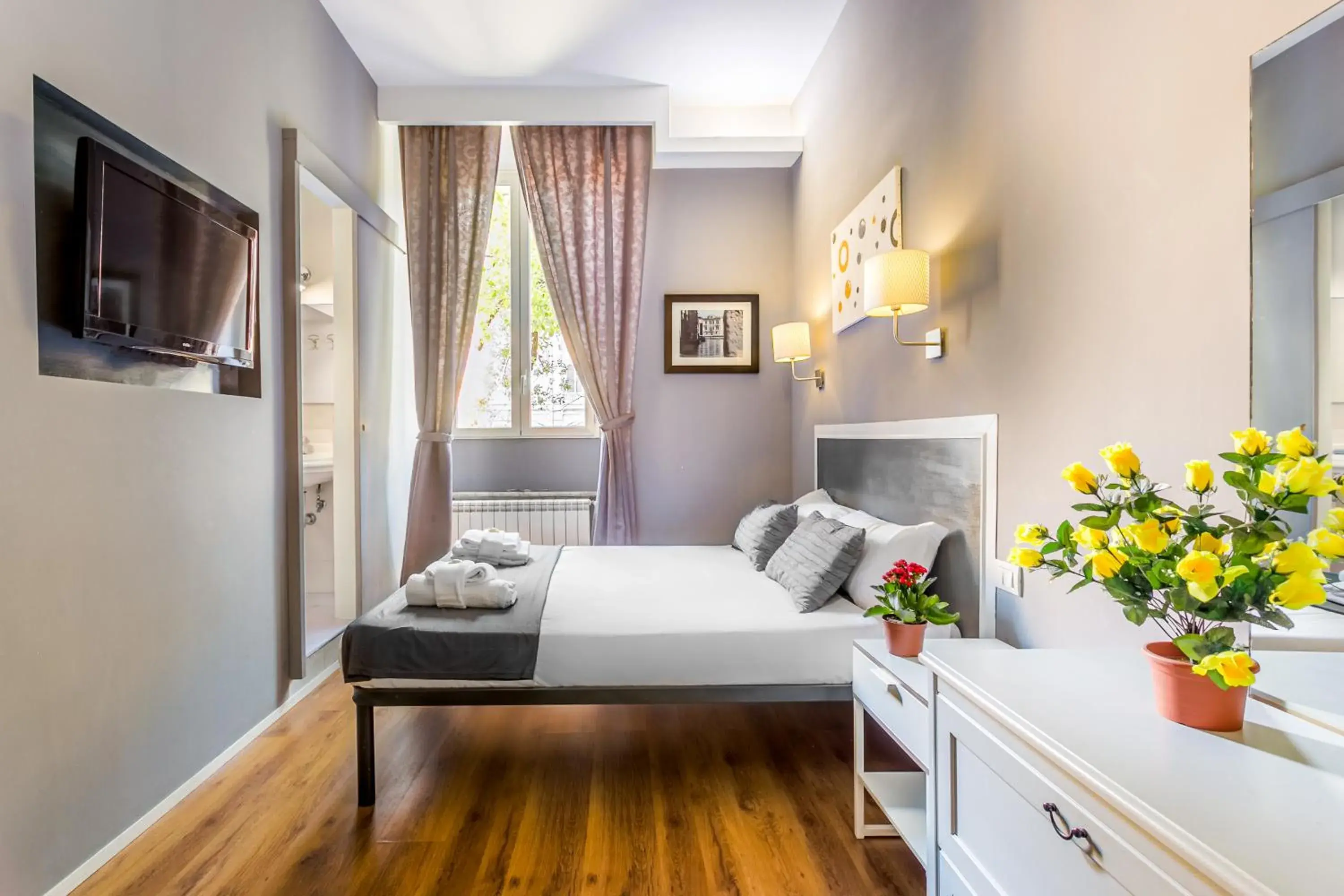 Triple Room with Garden View in AmoRoma Suite Triple Room with Garden View in AmoRoma Suite