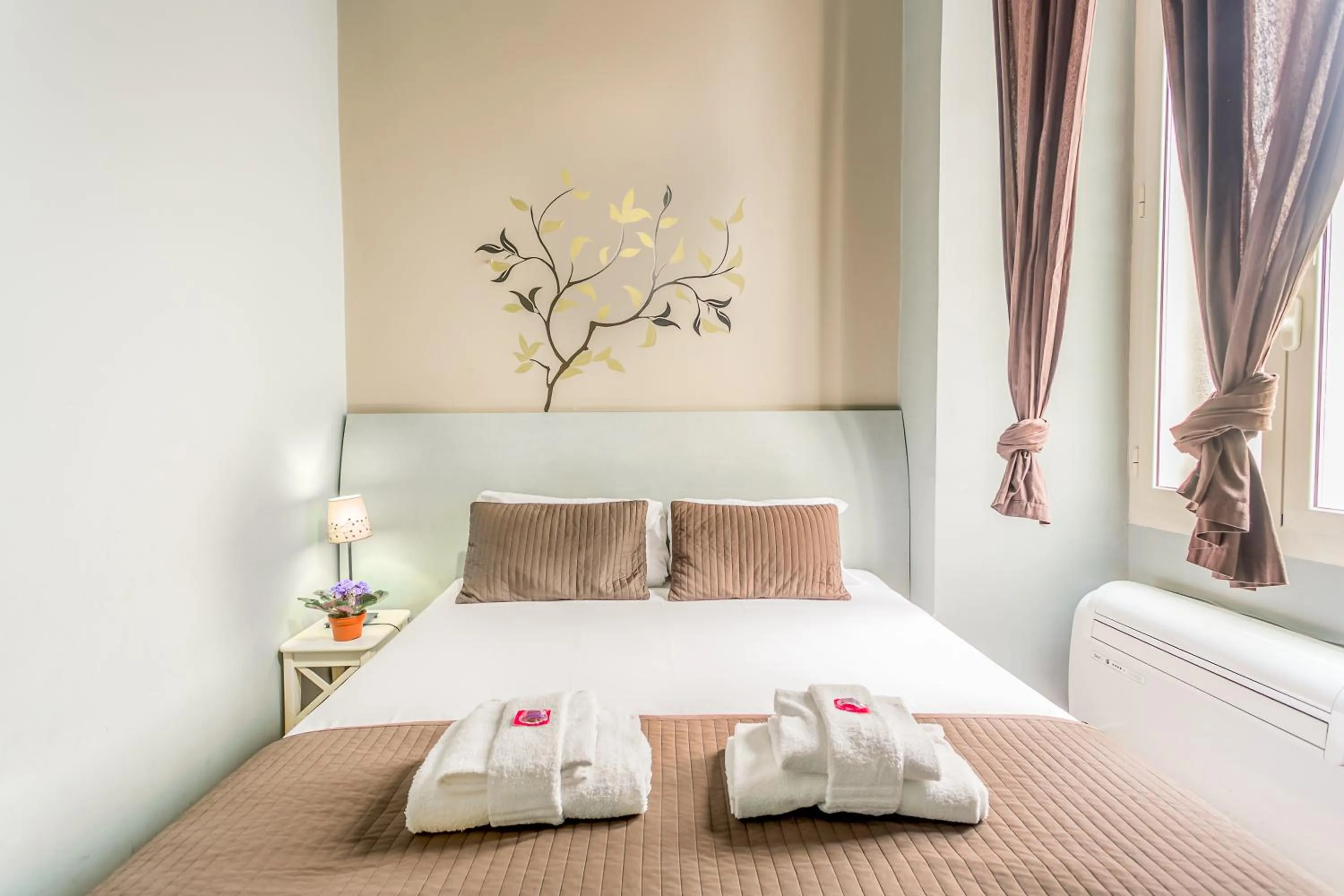 Bed in AmoRoma Suite