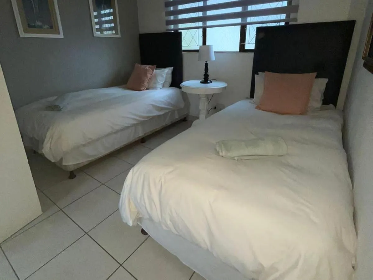 Living room, Bed in Bougainvillea BNB