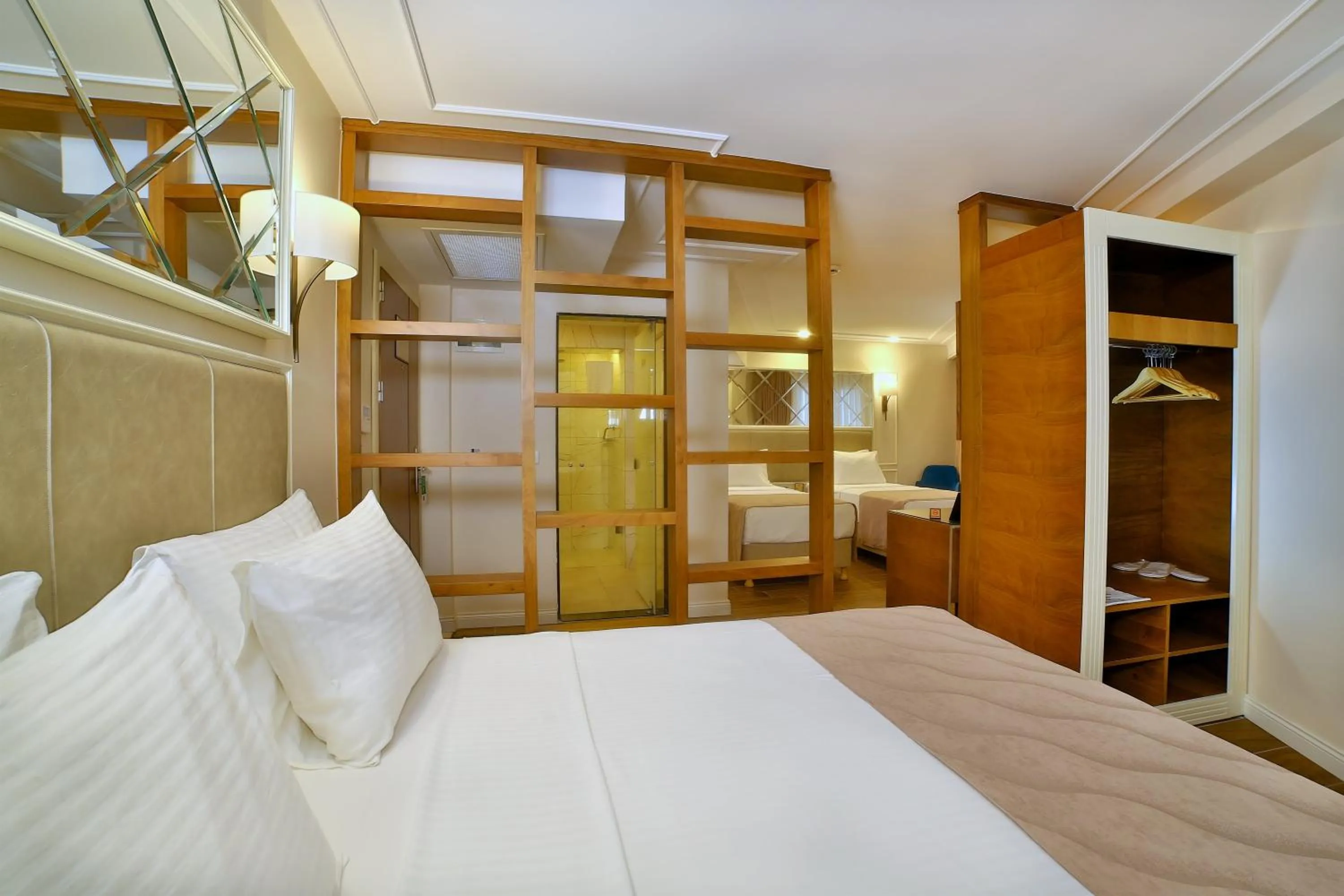 Bed in SORRISO HOTEL DUE