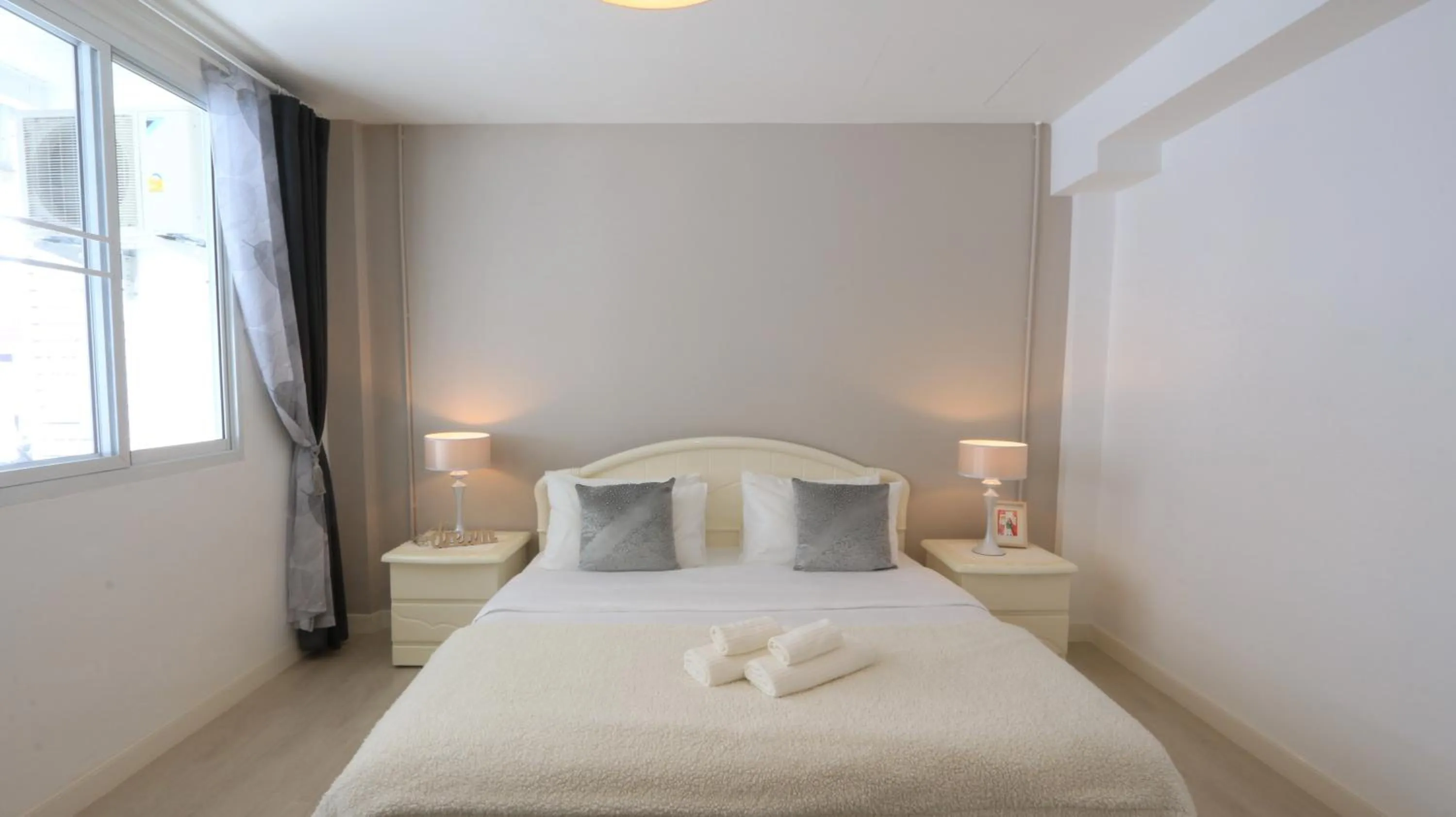 Bed in Airee Premier Residence