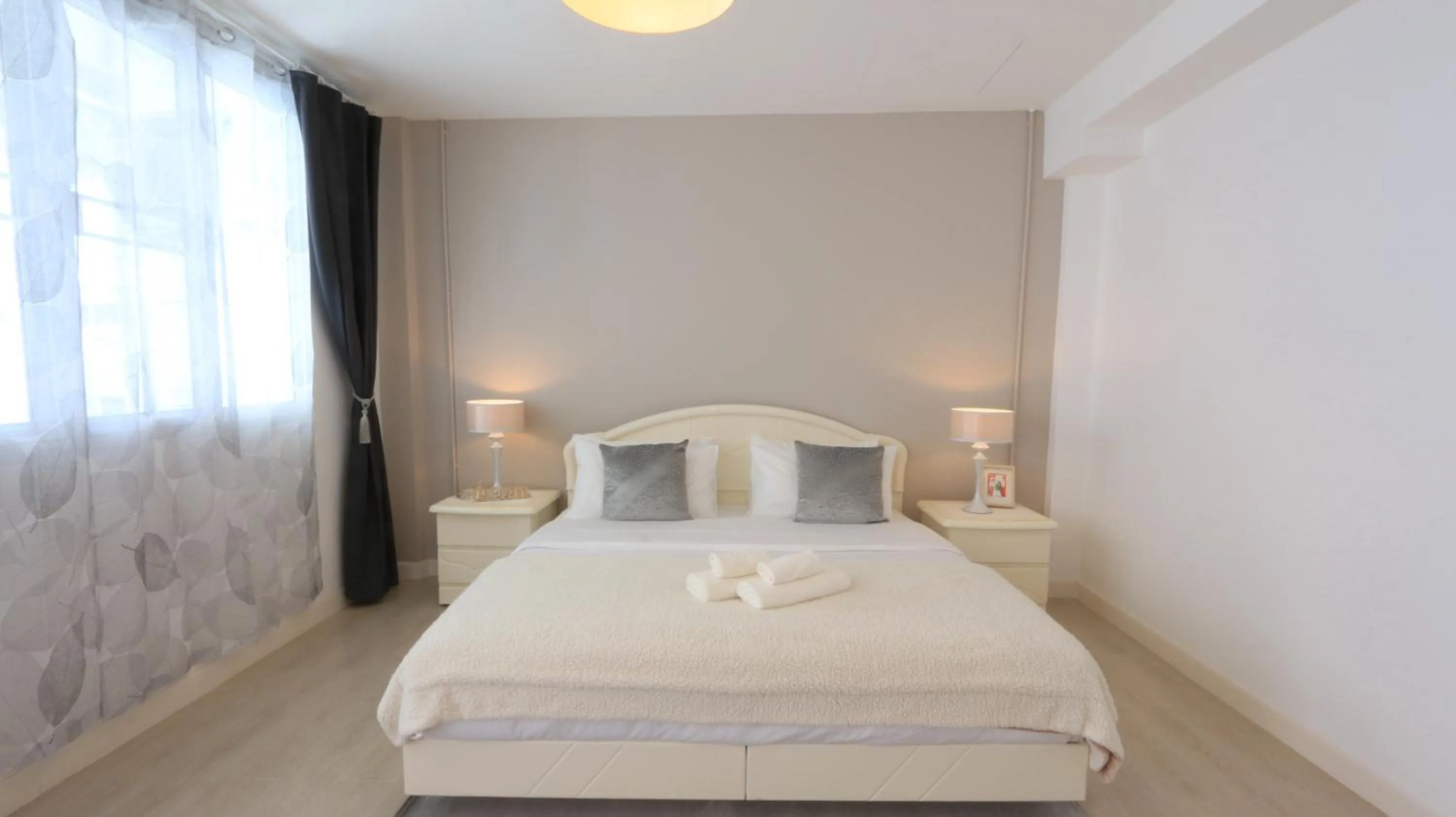 Bed in Airee Premier Residence