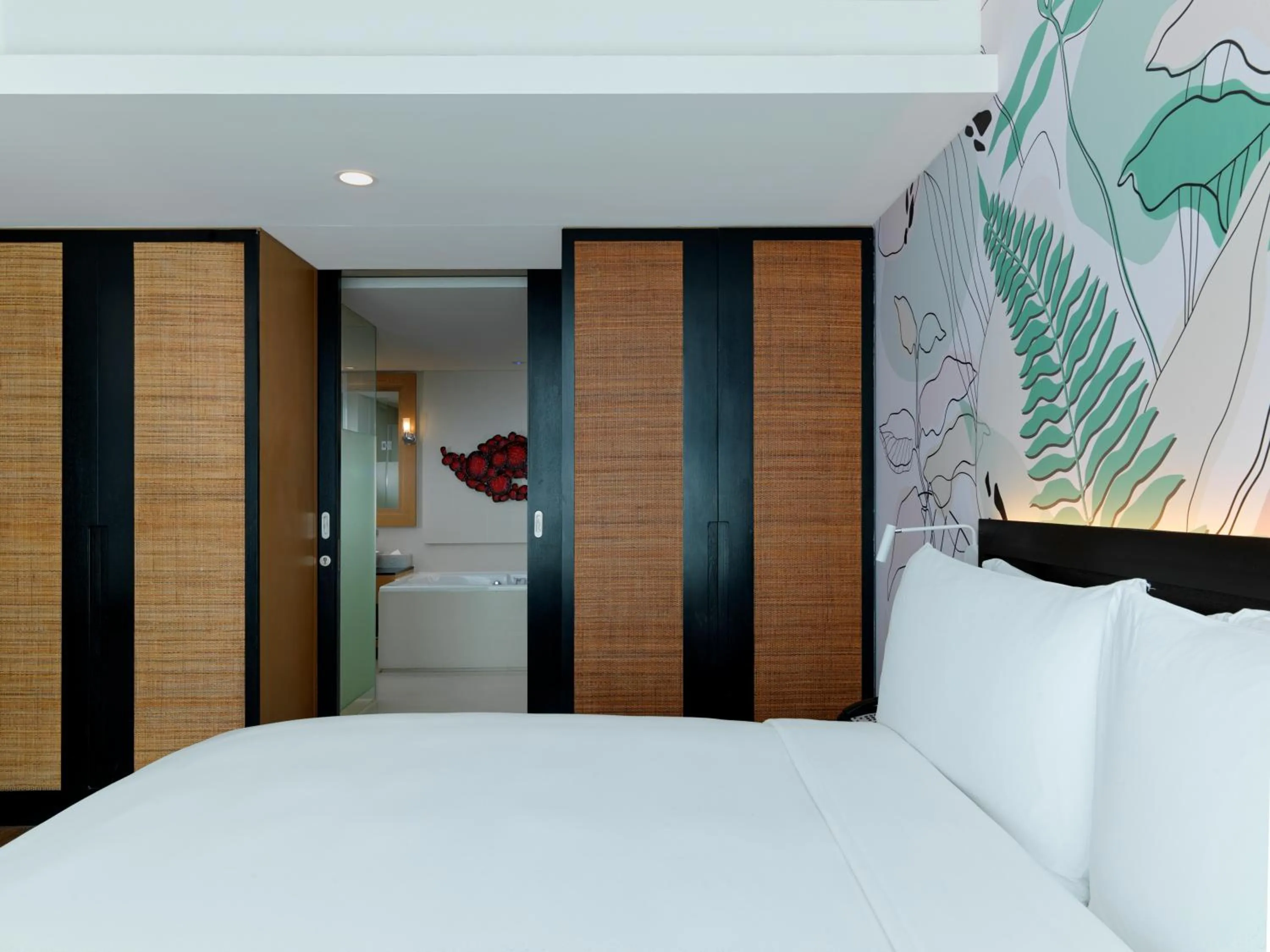 Bed in Avani Plus Mai Khao Phuket Suites