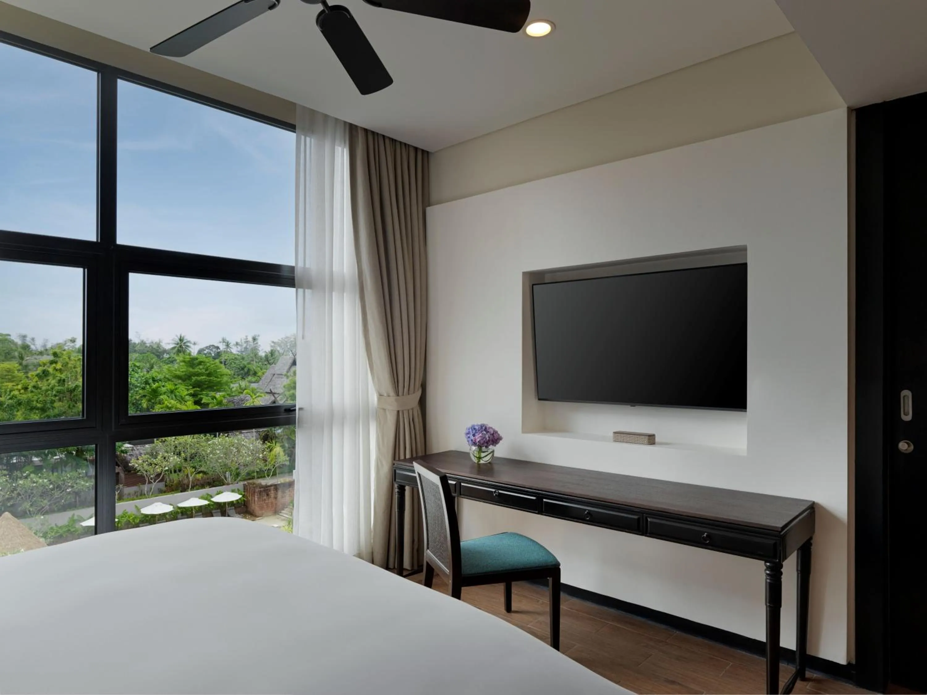 Bed in Avani Plus Mai Khao Phuket Suites