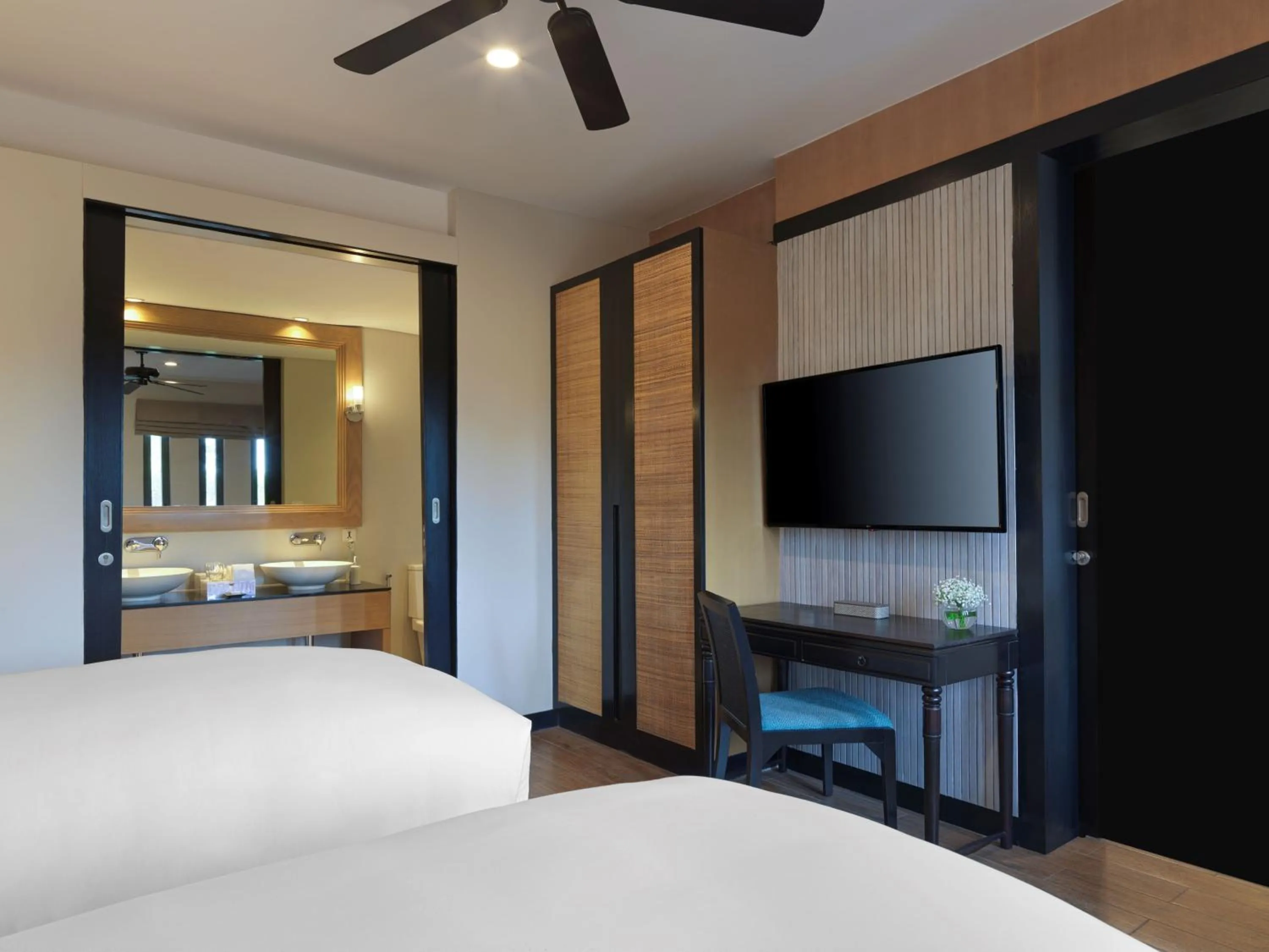 Bed in Avani Plus Mai Khao Phuket Suites