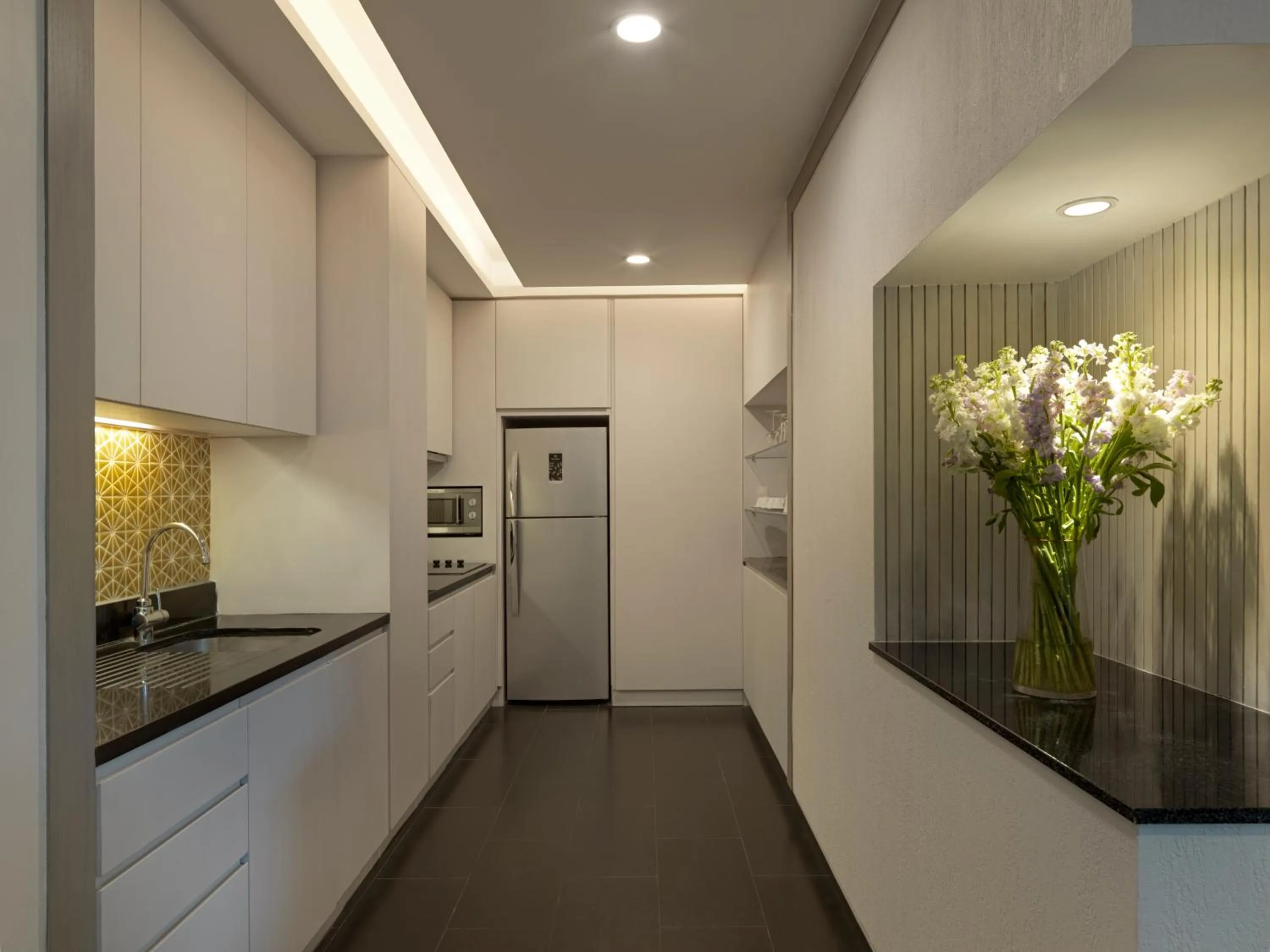Kitchen or kitchenette in Avani Plus Mai Khao Phuket Suites
