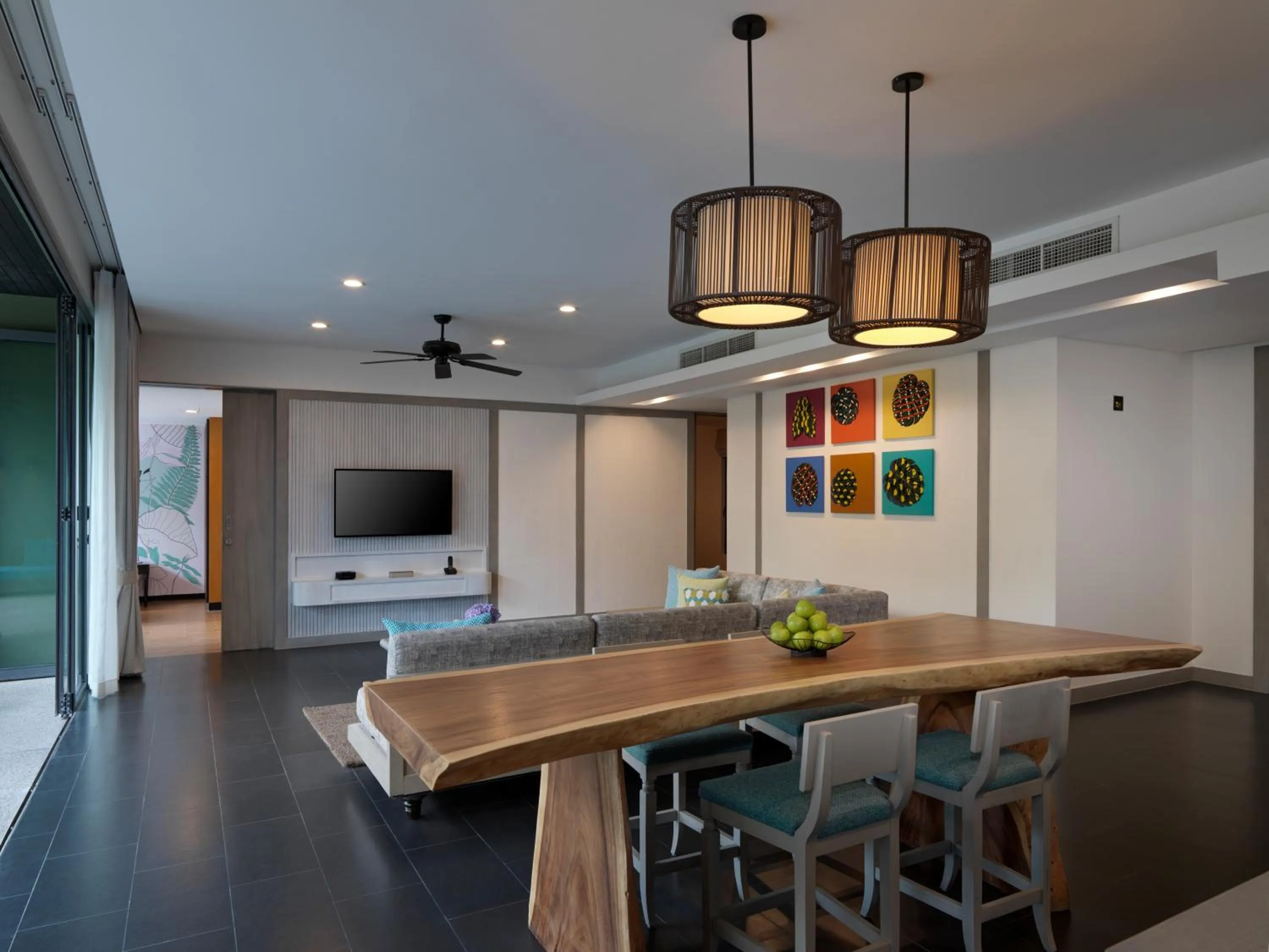 Communal lounge/ TV room in Avani Plus Mai Khao Phuket Suites