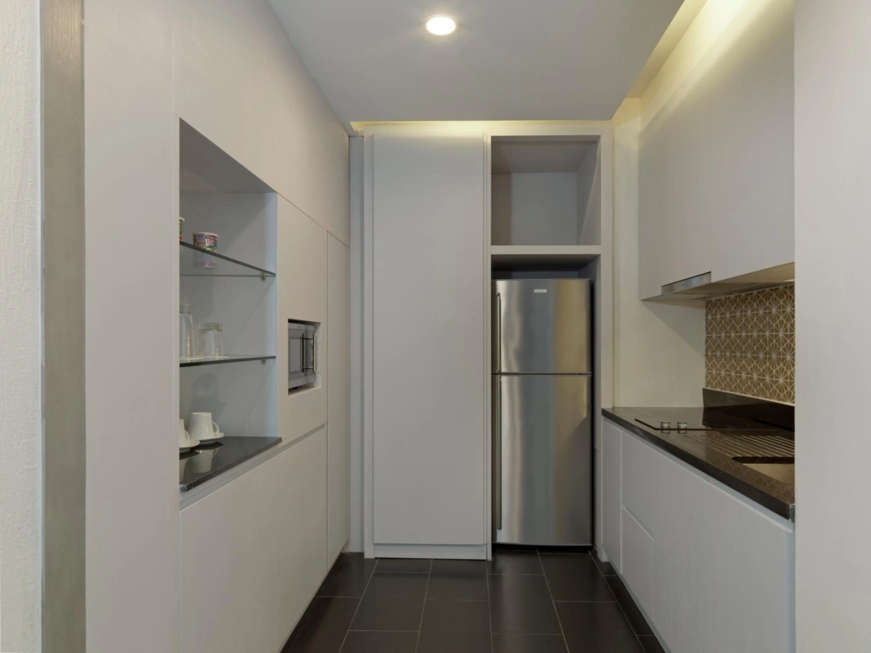 Kitchen or kitchenette in Avani Plus Mai Khao Phuket Suites