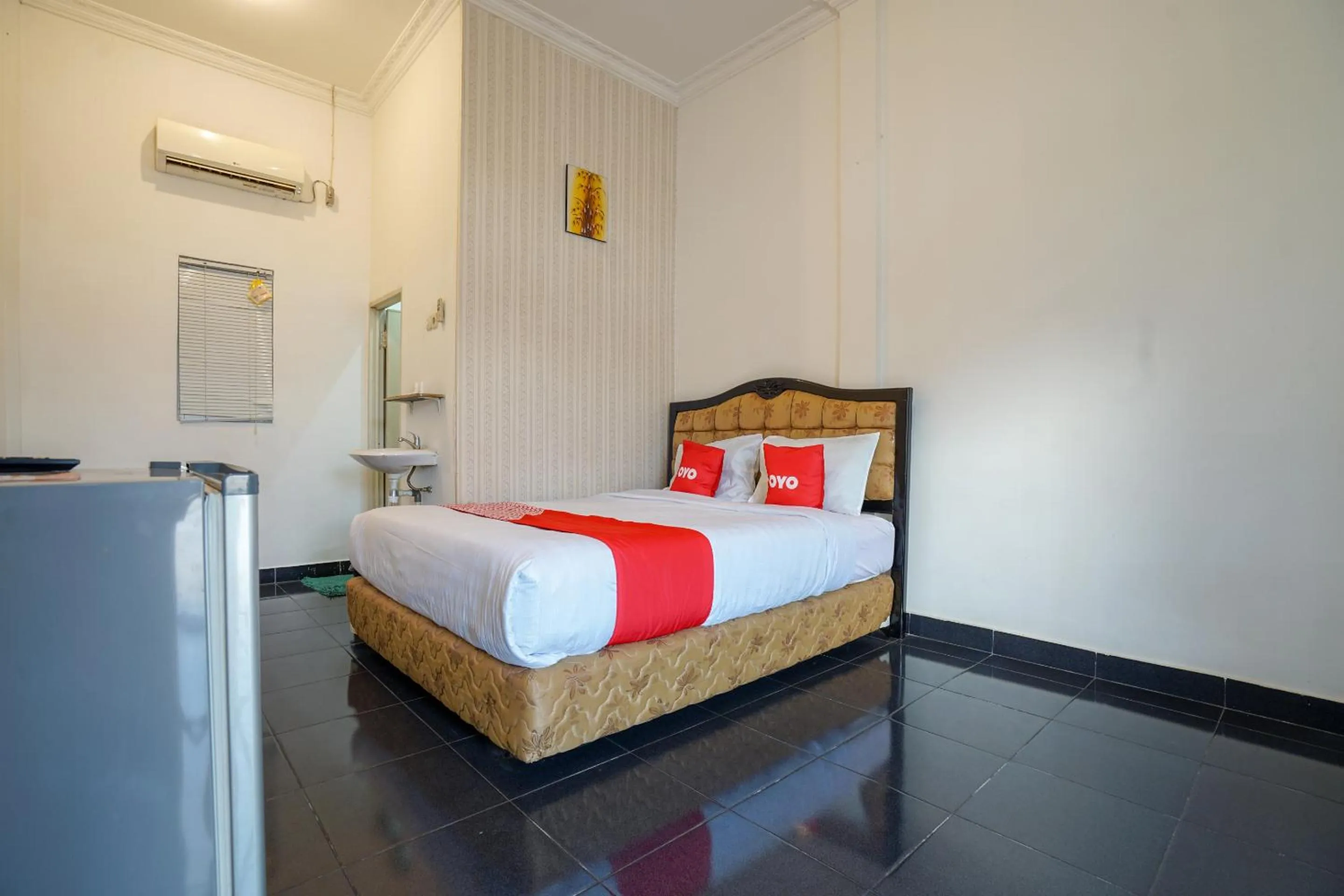 Bedroom in OYO 2036 Afifah Homestay Syariah