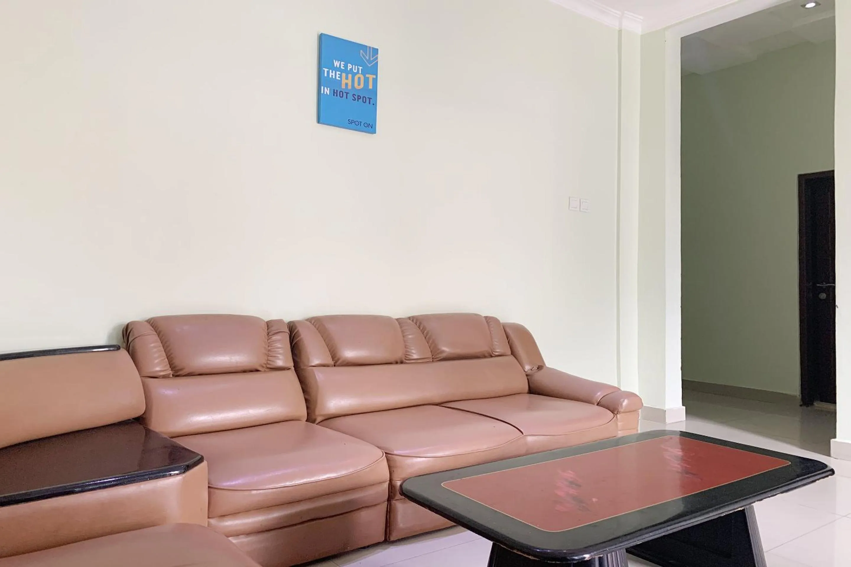 Seating area in RedDoorz Syariah Near Jam Gadang Bukit tinggi 2