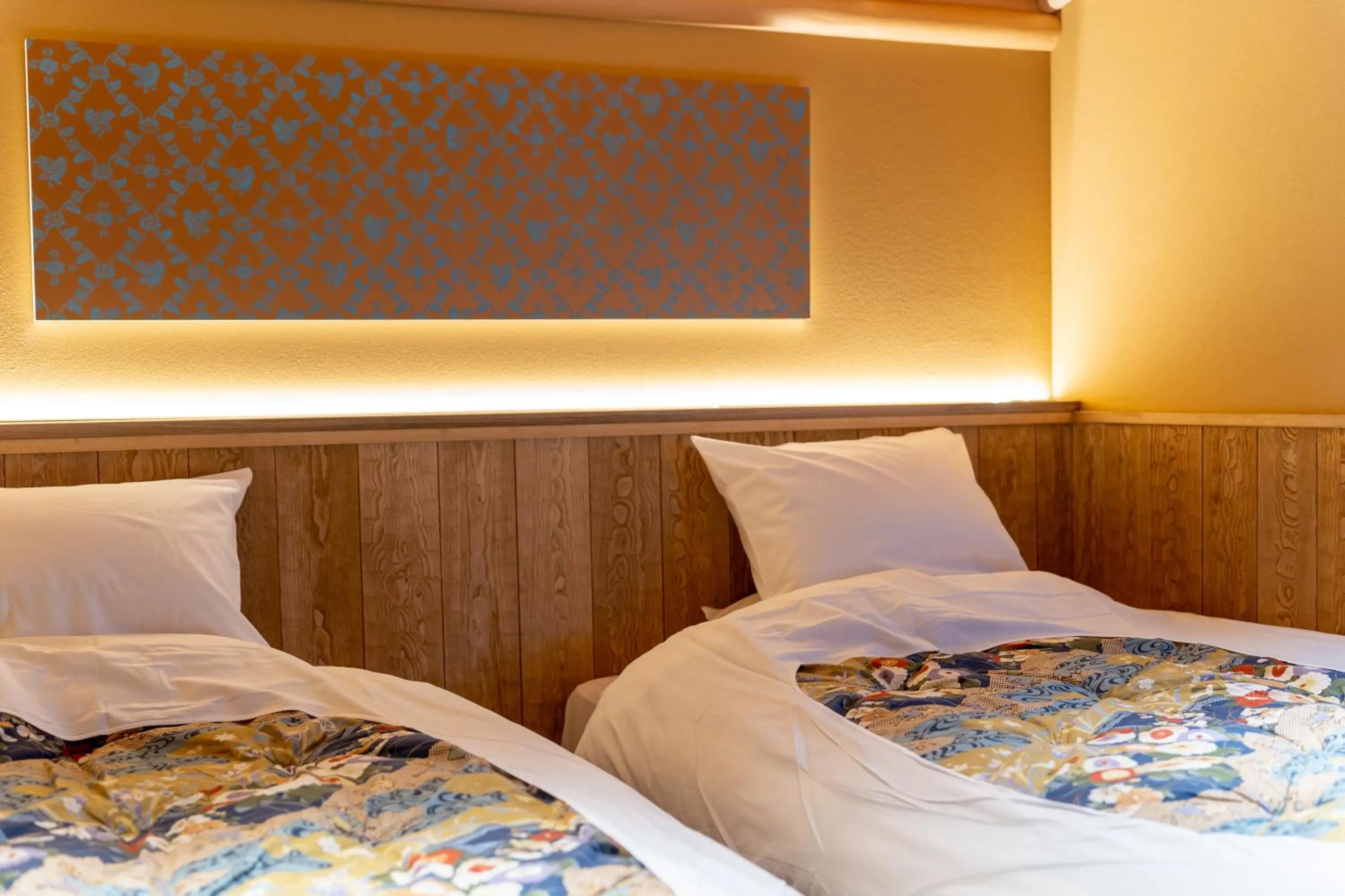 Bed in Nishiyama Ryokan - Established in 1953