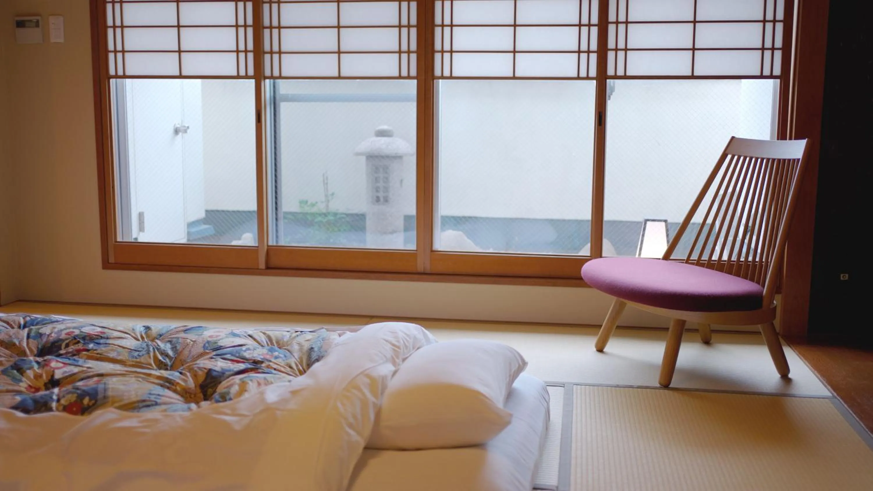 Bed in Nishiyama Ryokan - Established in 1953