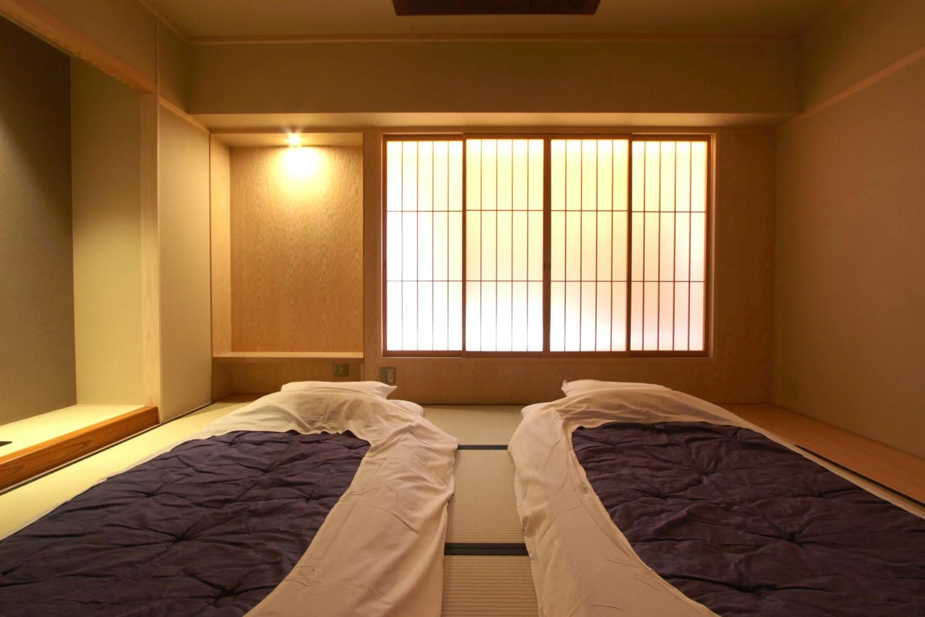 Photo of the whole room, Bed in Nishiyama Ryokan - Established in 1953