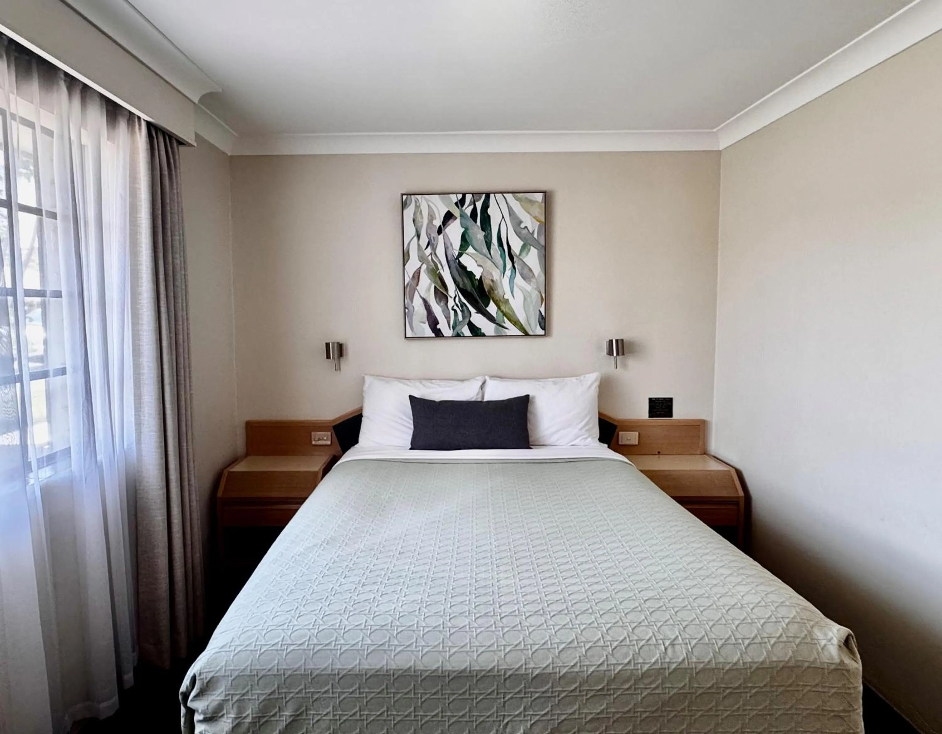 Bed in Colonial Terrace Motor Inn