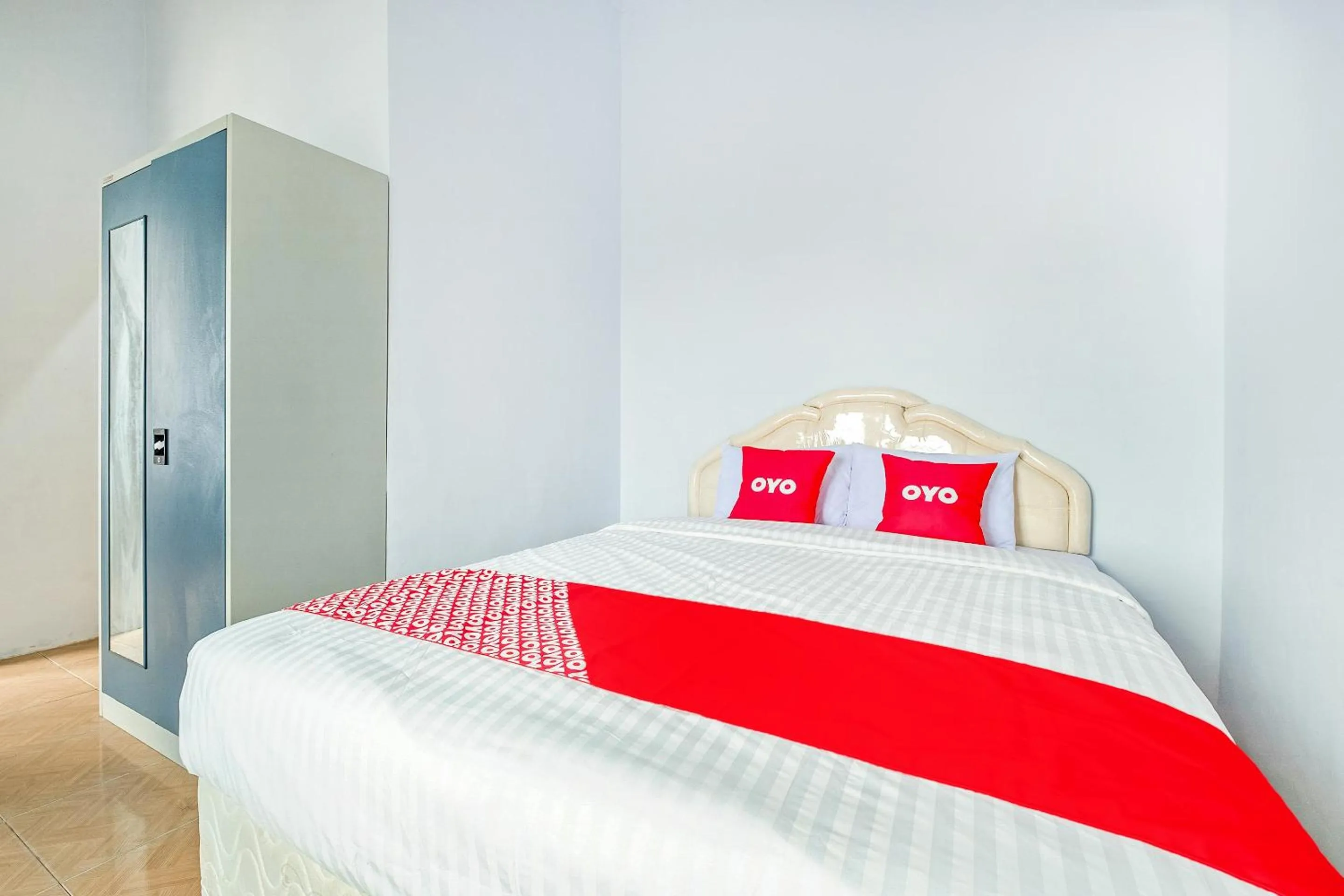 Bedroom in OYO 1906 Zhafira Guest House Syariah