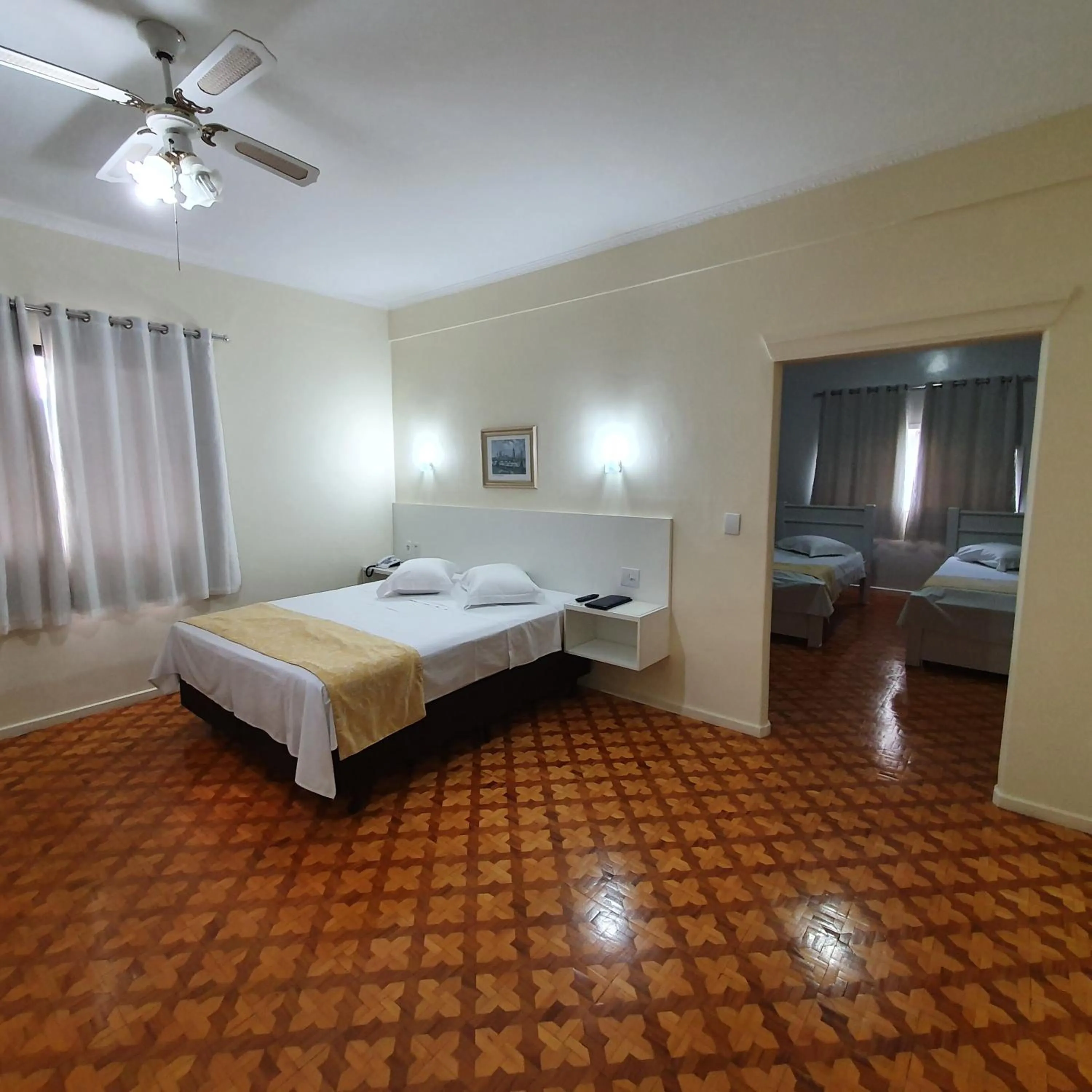 Bed in Grand Ville Hotel