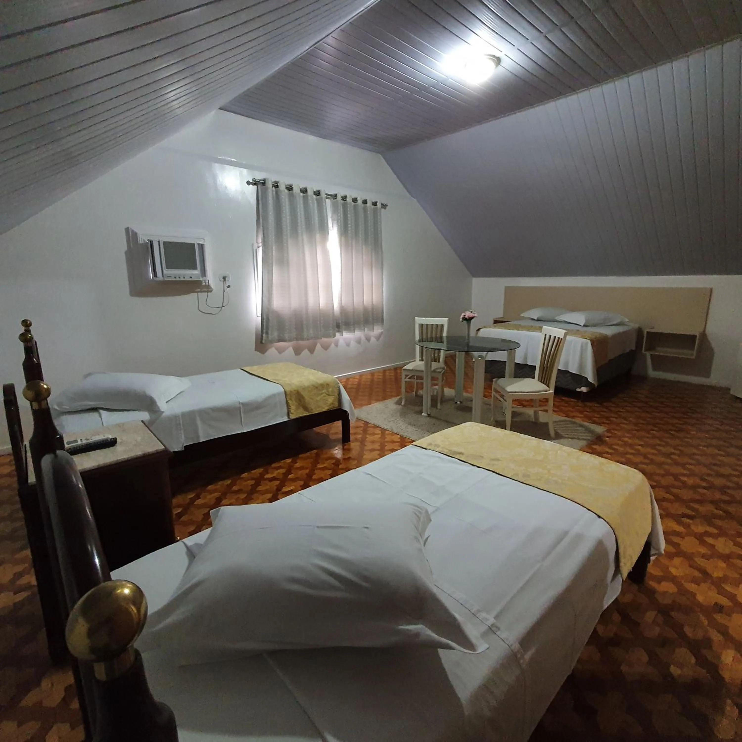 Bed in Grand Ville Hotel