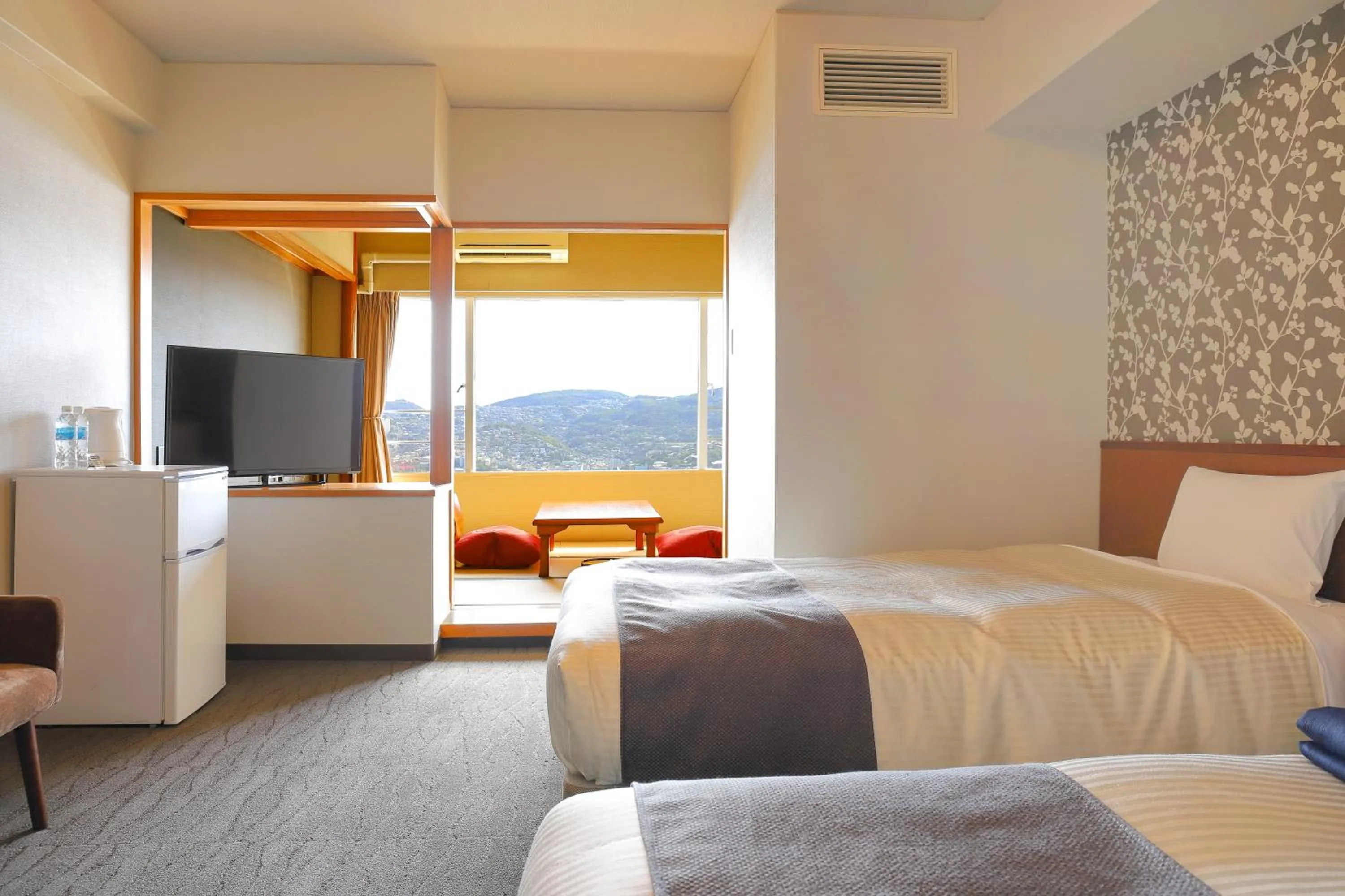 Photo of the whole room, Bed in Ooedo Onsen Monogatari Nagasaki Hotel Seifu