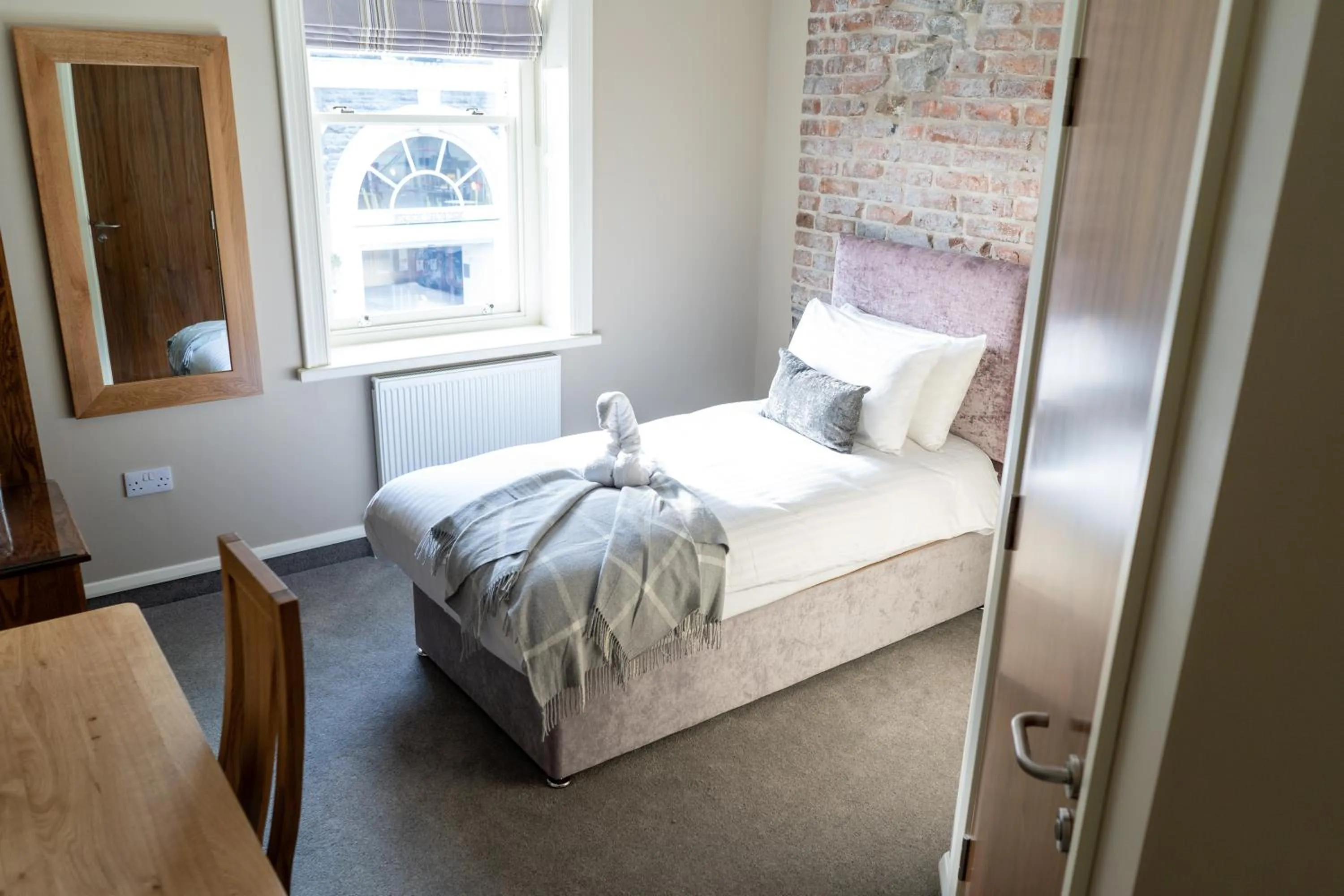 Bed in Tredegar Arms Hotel