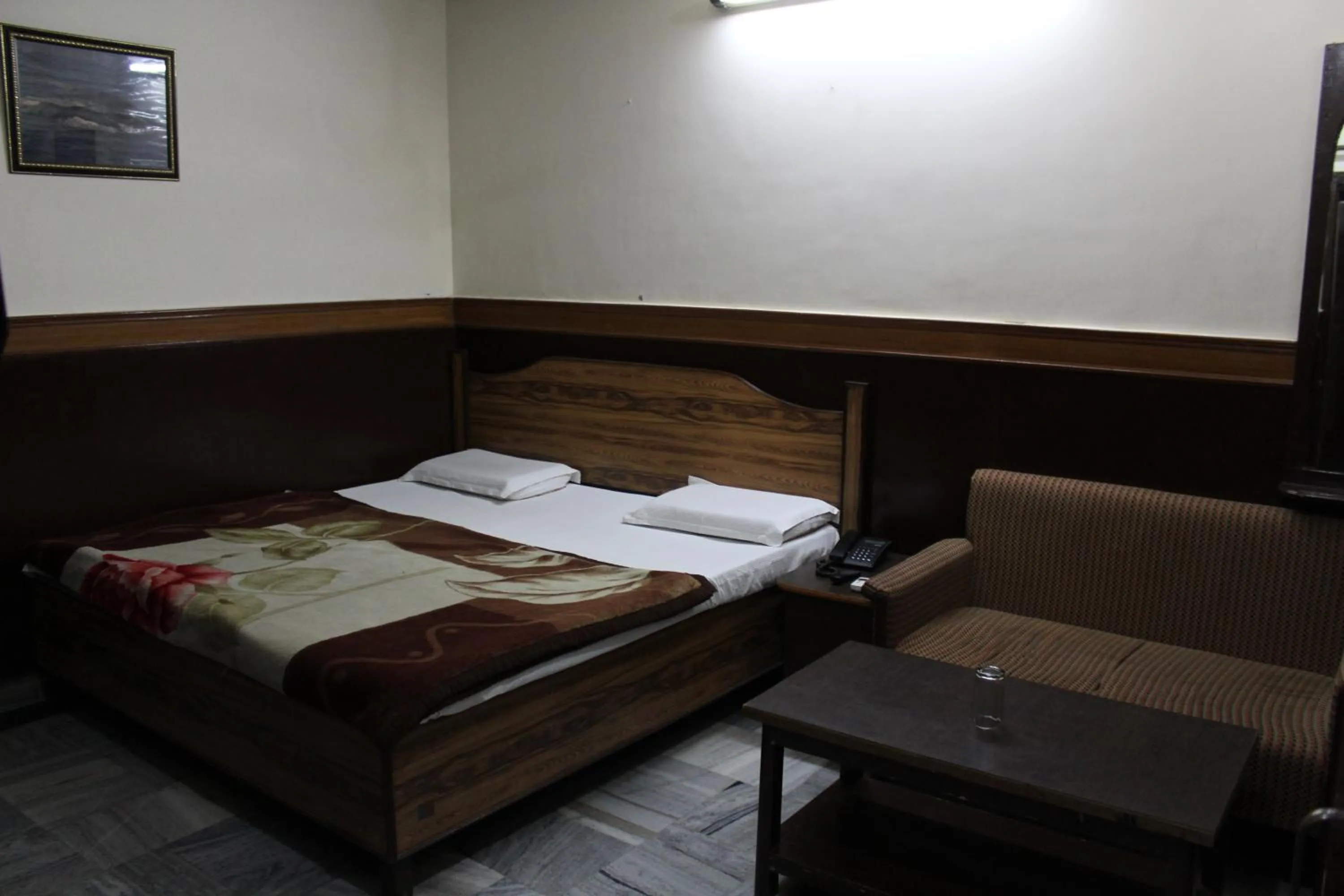 Bed in Hotel Ajay International