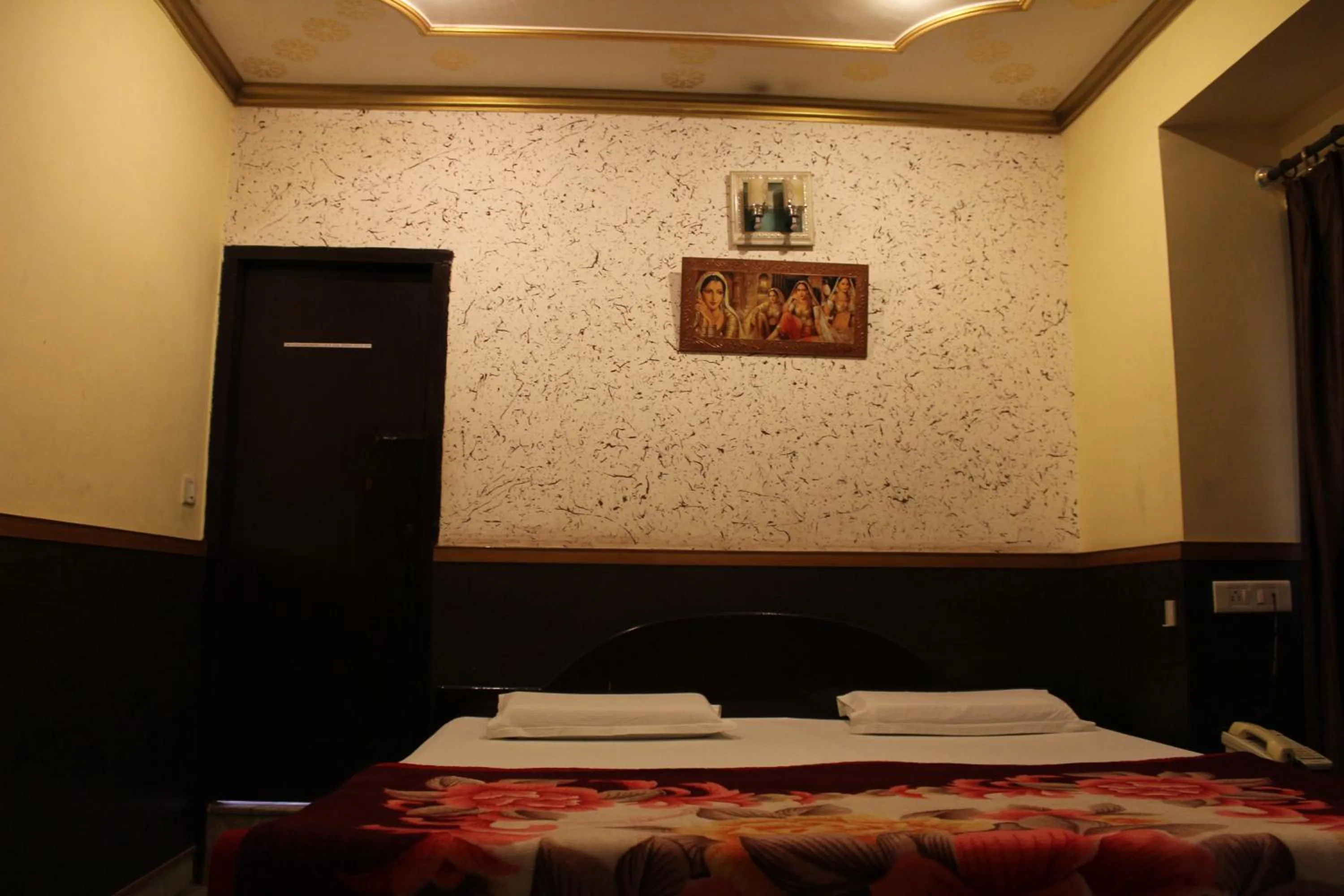 Bed in Hotel Ajay International