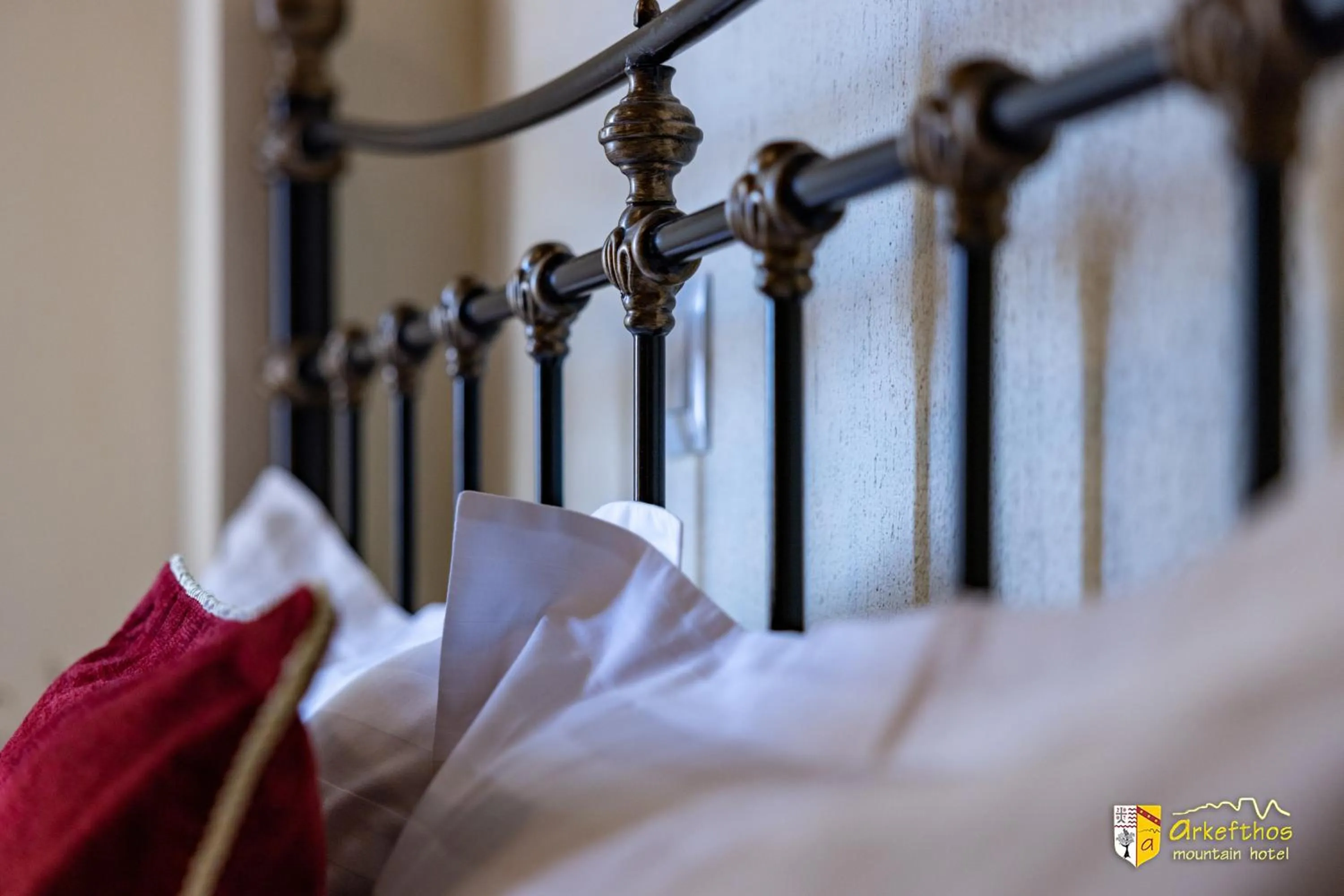 Bed in Arkefthos Mountain Hotel