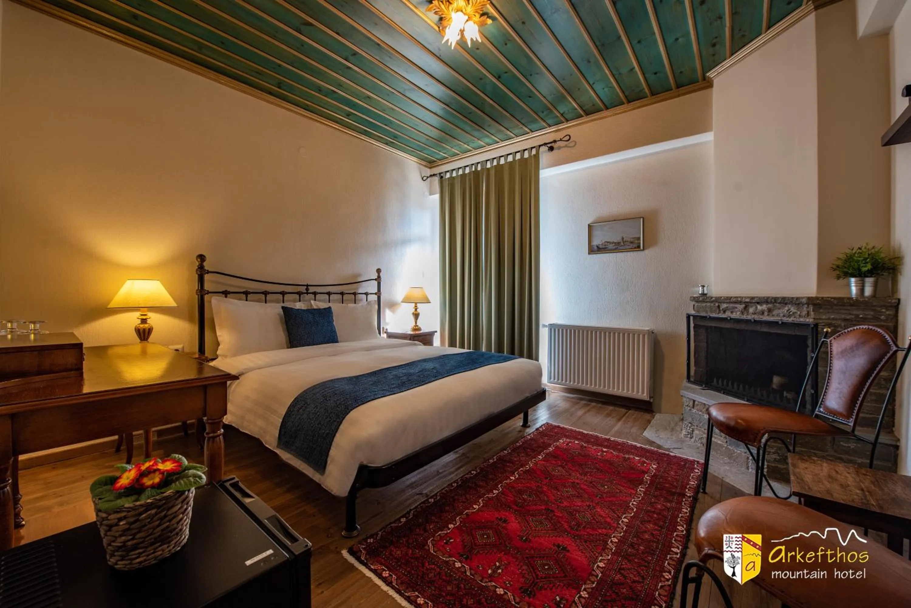 Bed in Arkefthos Mountain Hotel