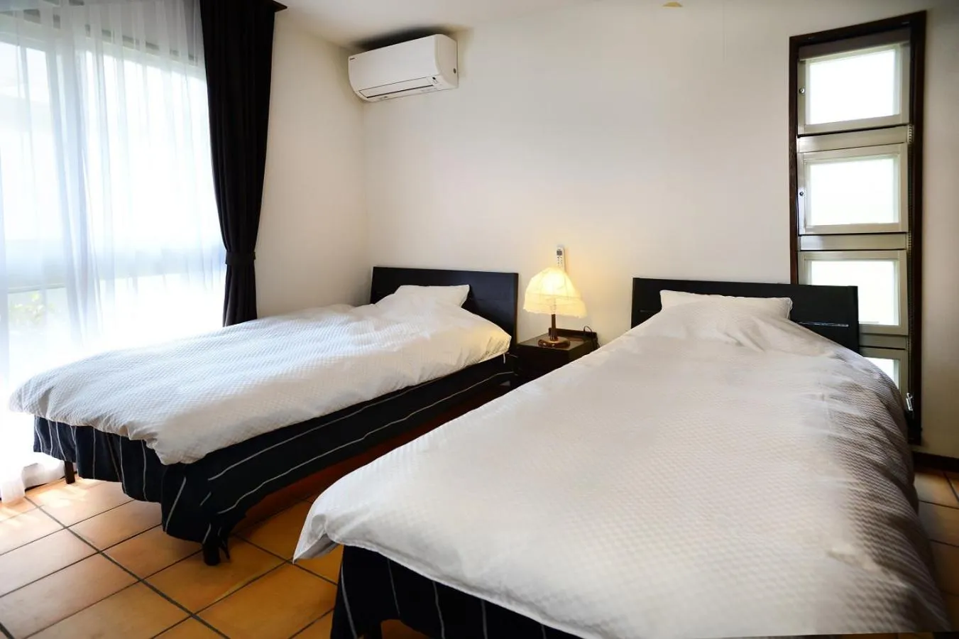 Bedroom, Bed in wisteria Ocean Nakijin