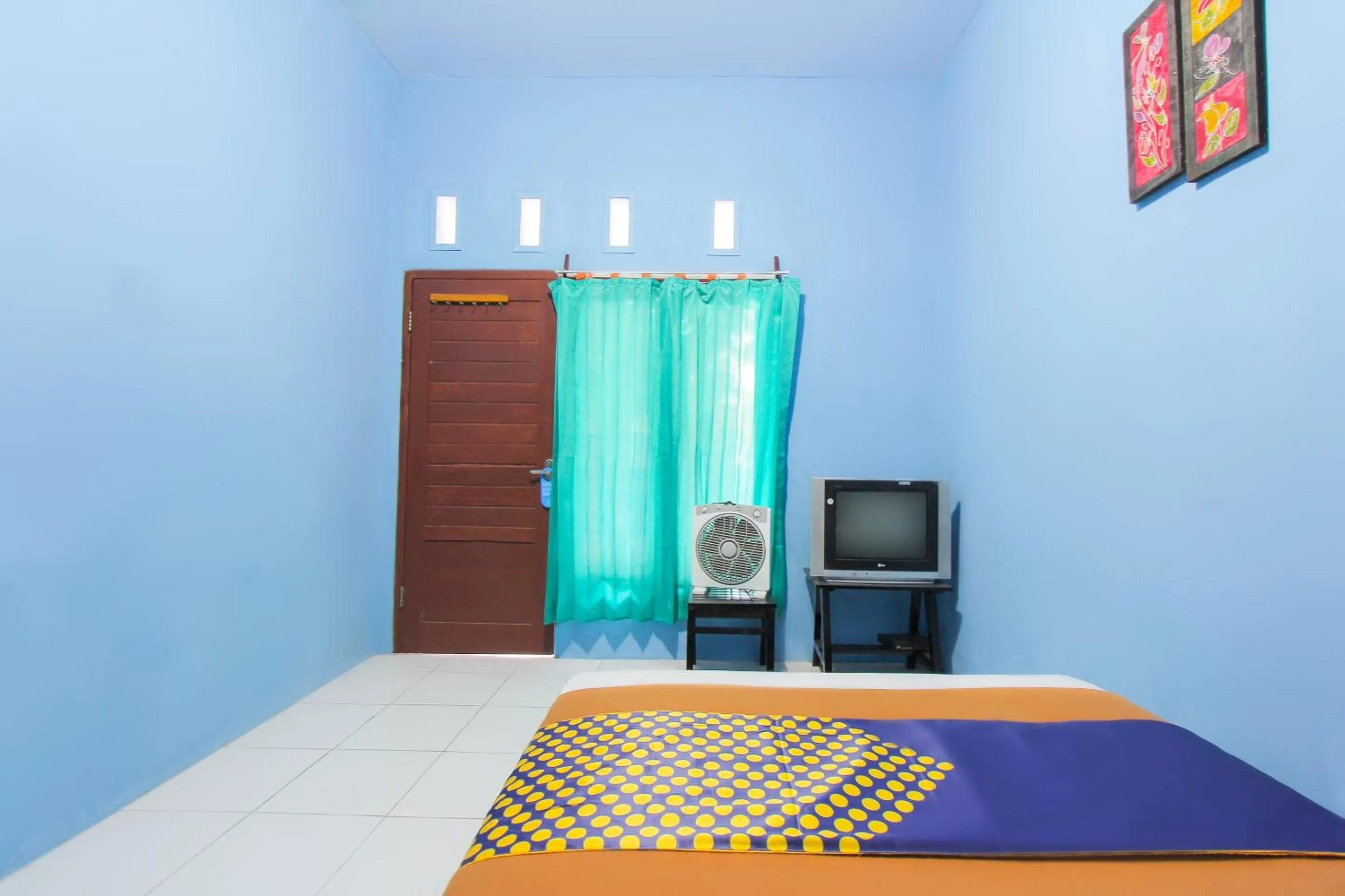 Bedroom in Hotel O Zam Zam Family Syariah