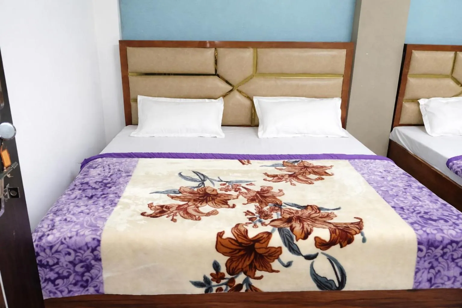 Bed in Mahamaya Guest House