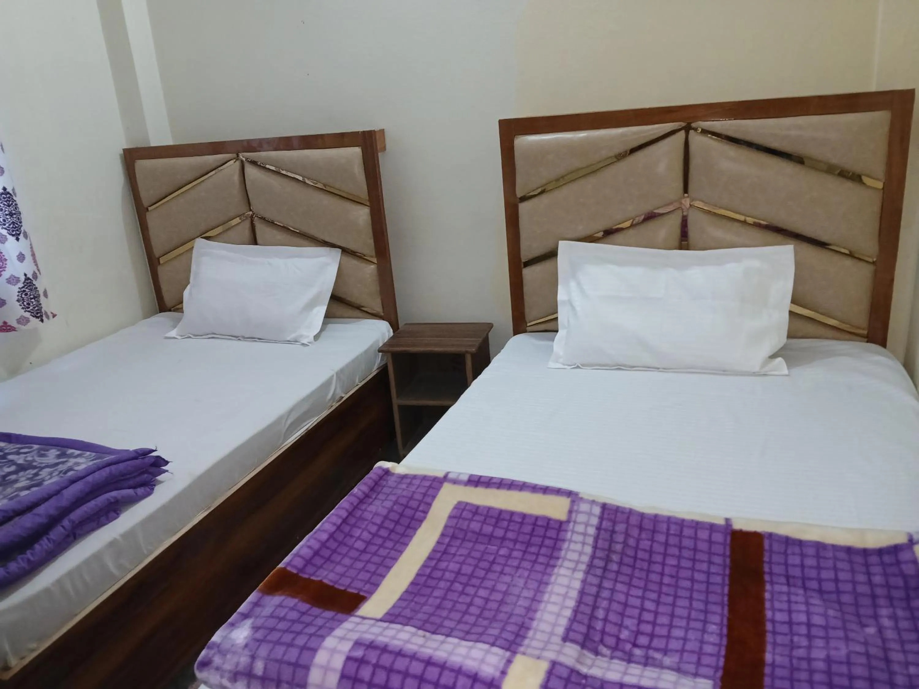 Bed in Mahamaya Guest House