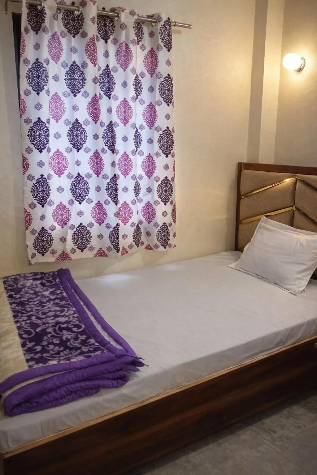Bed in Mahamaya Guest House