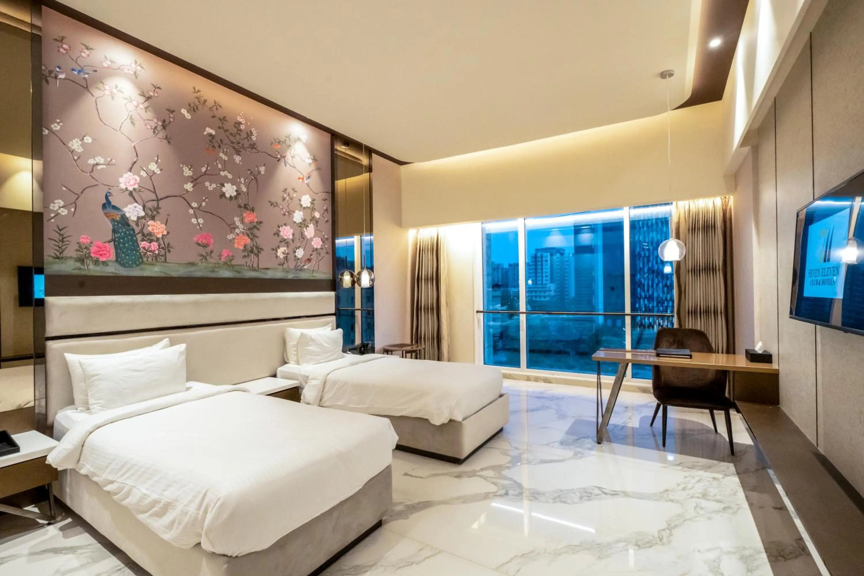 Bed in Seven Eleven Hotels and Club