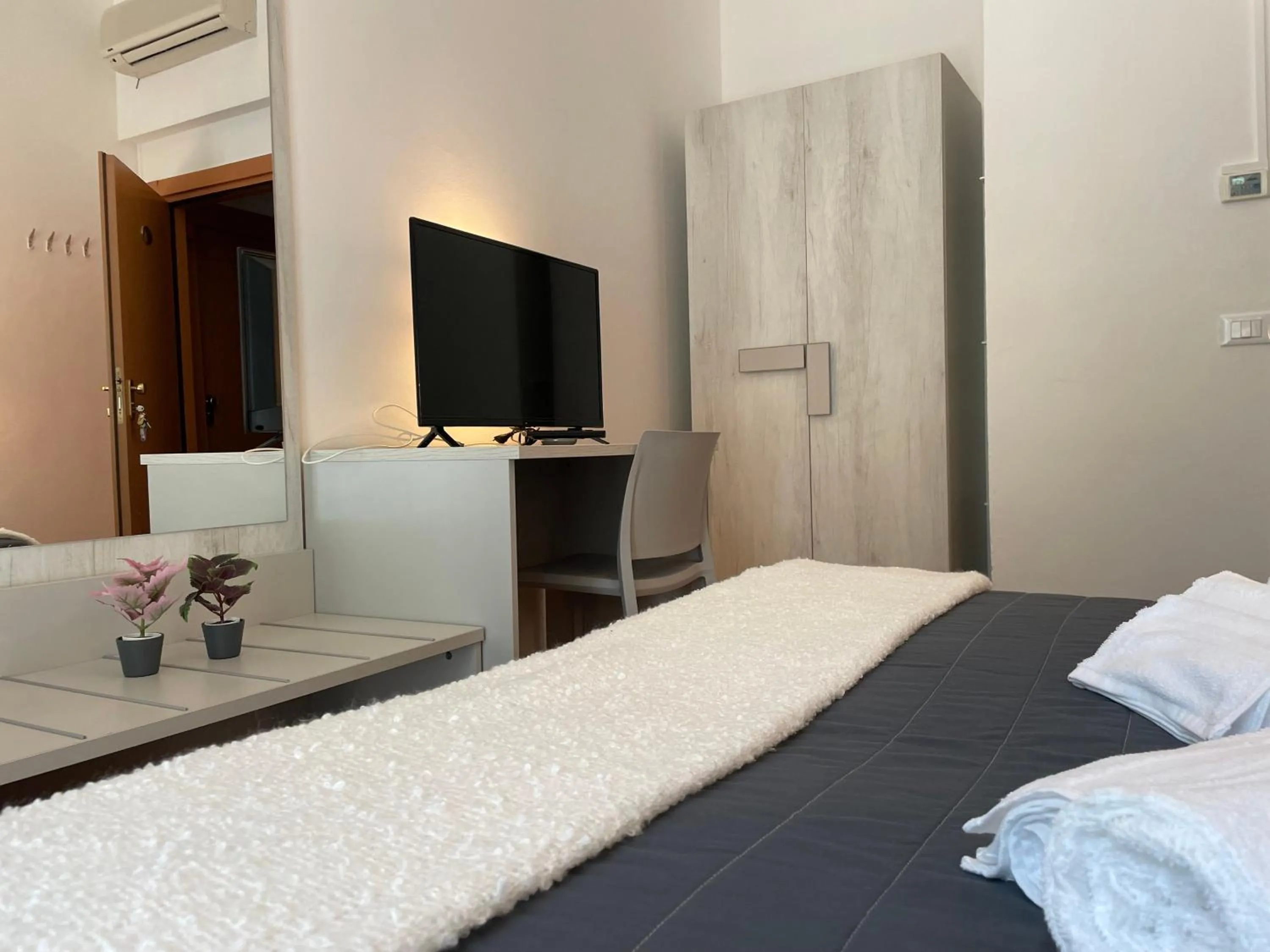 Bed in Hotel Augustus