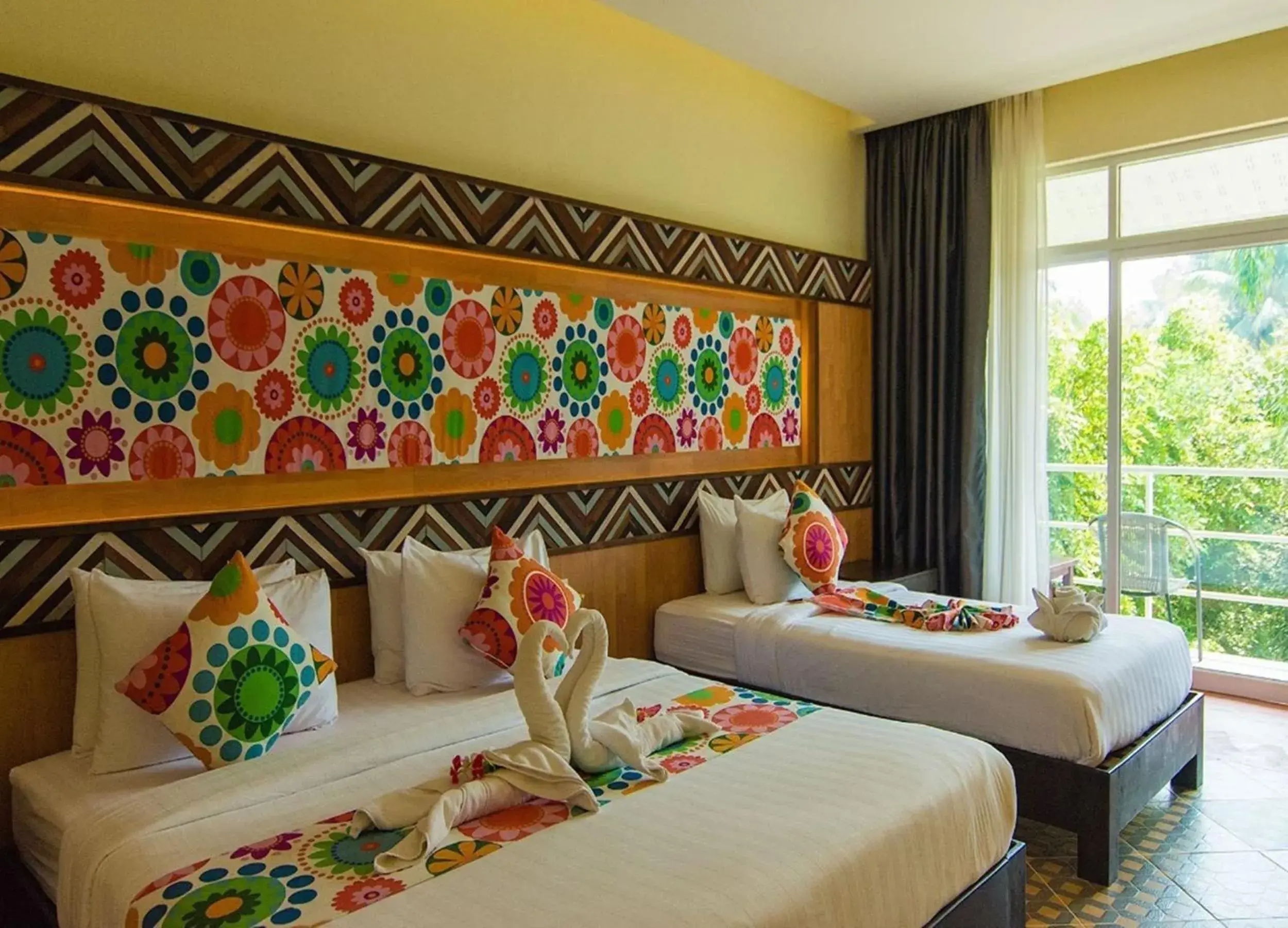 Superior Triple Room with Garden View in Good Times Resort Kanchanaburi Superior Triple Room with Garden View in Good Times Resort Kanchanaburi