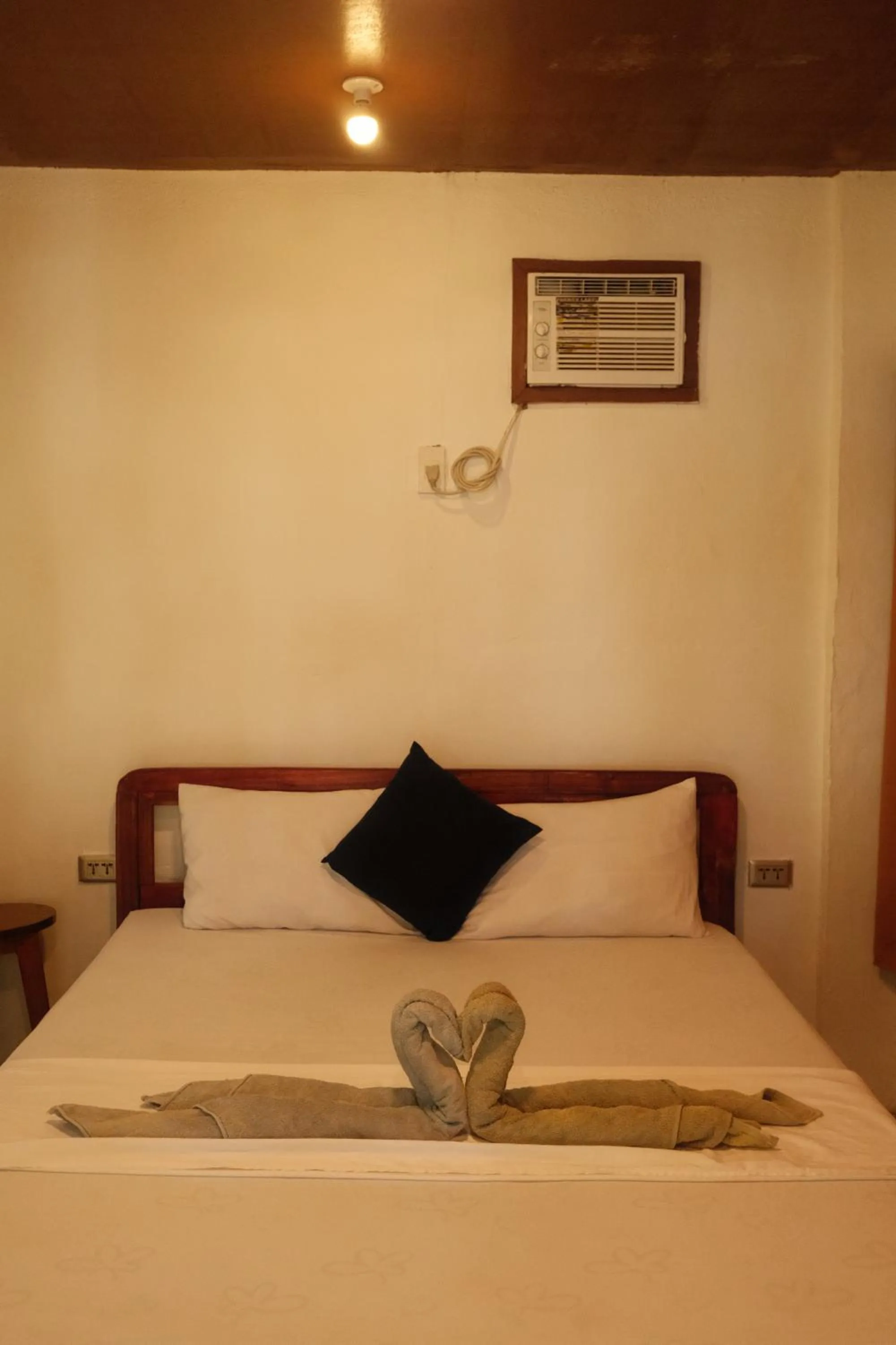 Bed in Cocovana Beach Resort