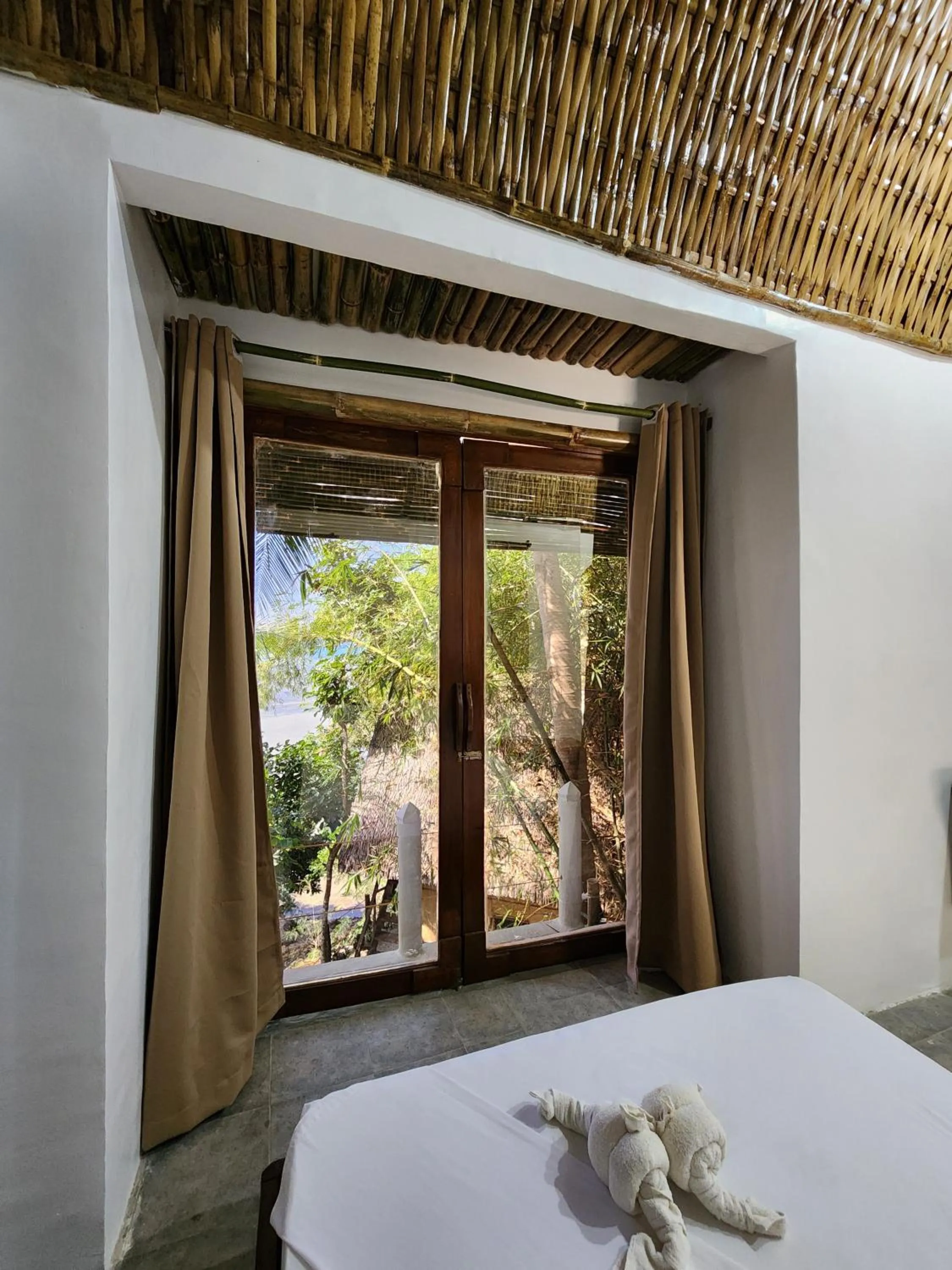 Bed in Cocovana Beach Resort