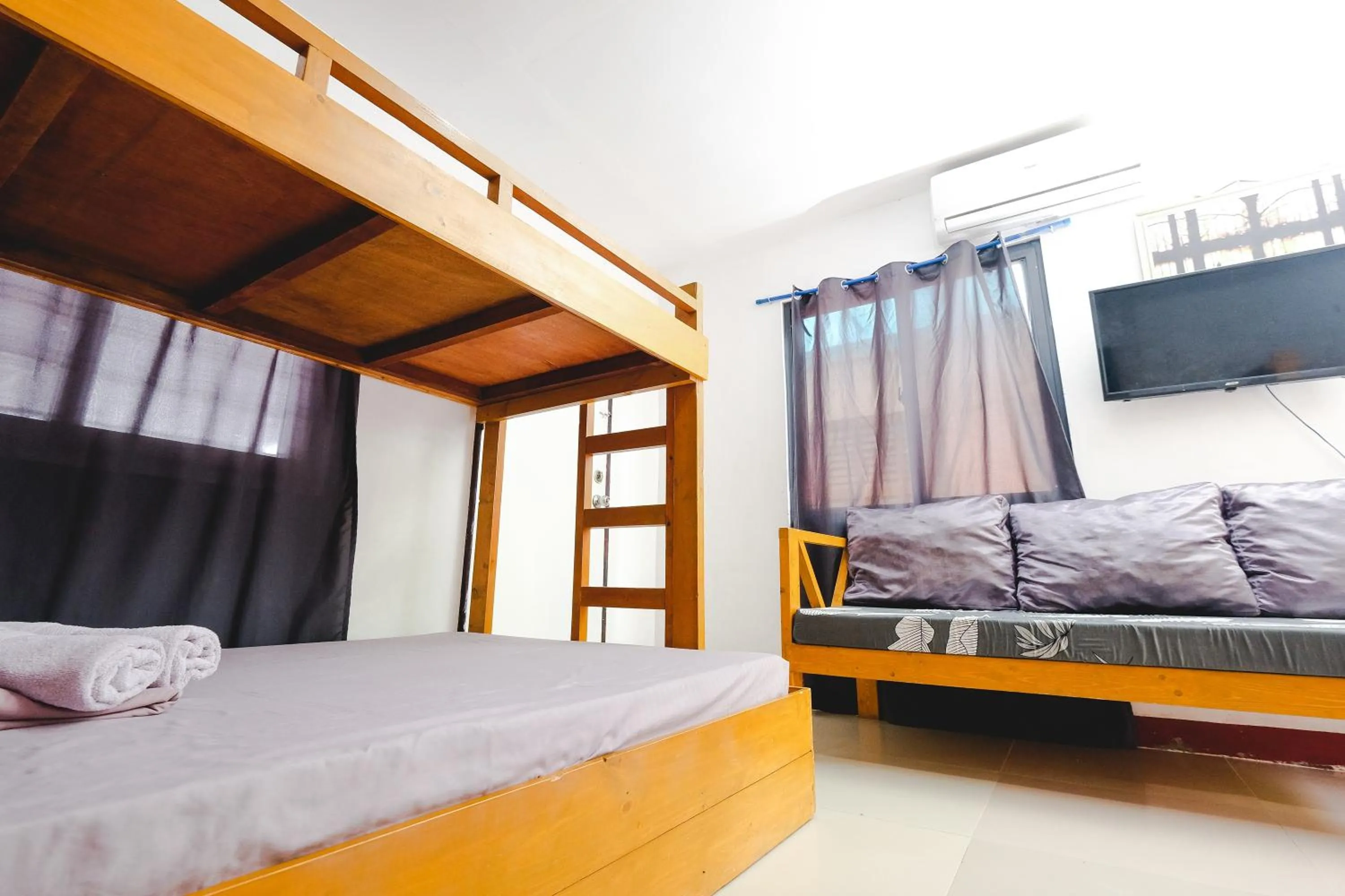 Bed in Monaliza Surf Resort La Union