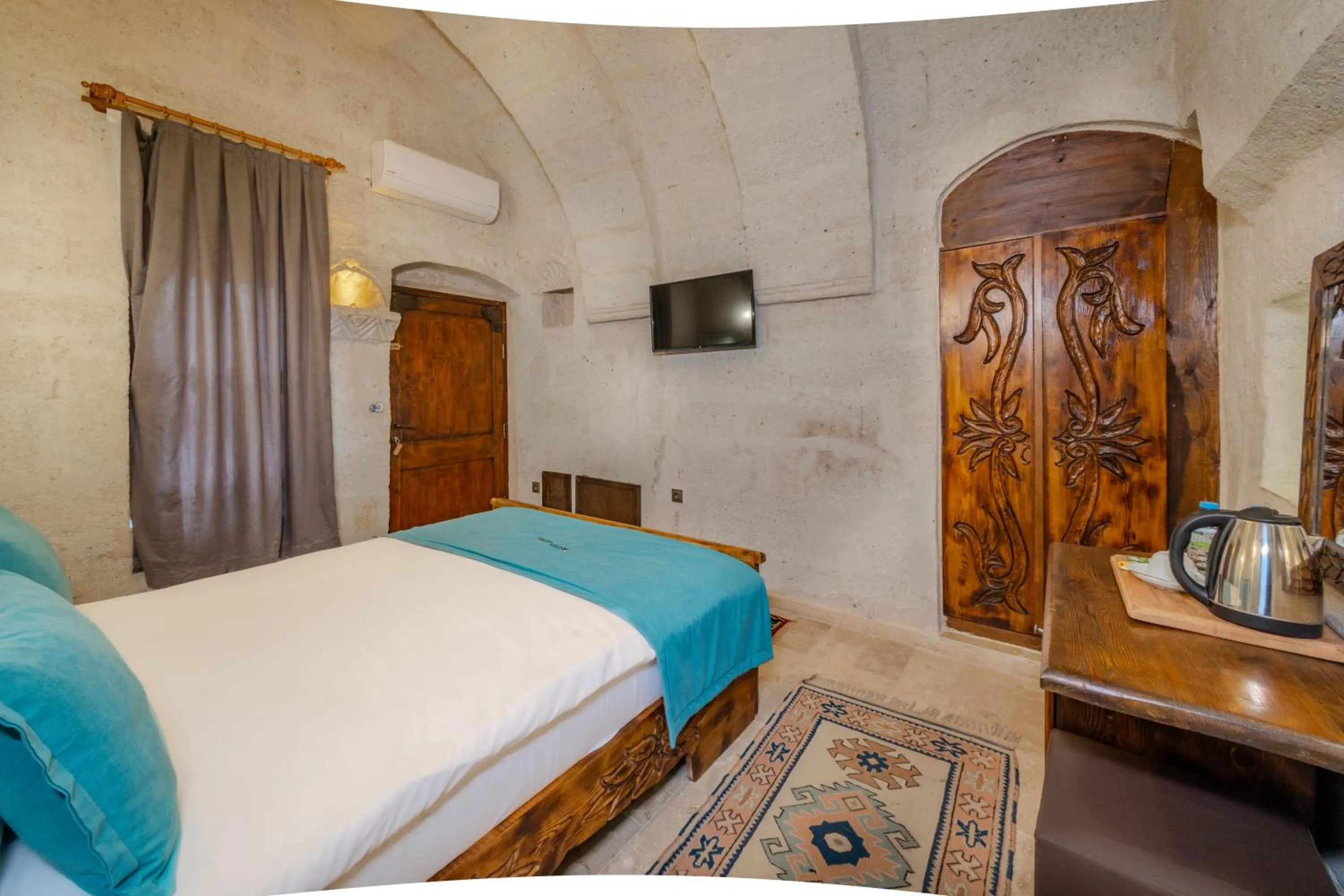 Bed in Angel Cappadocia Cave Hotel