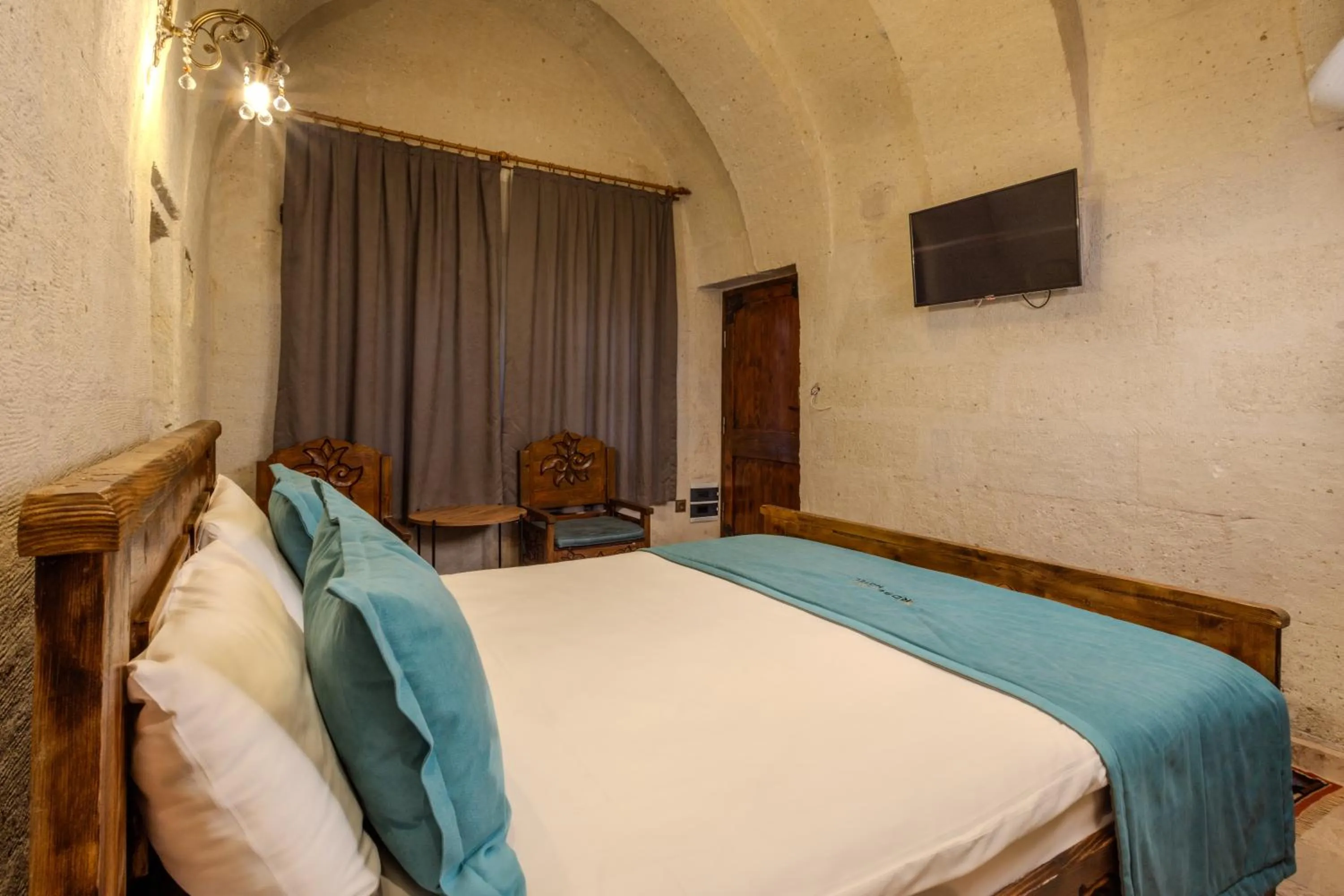 Bed in Angel Cappadocia Cave Hotel