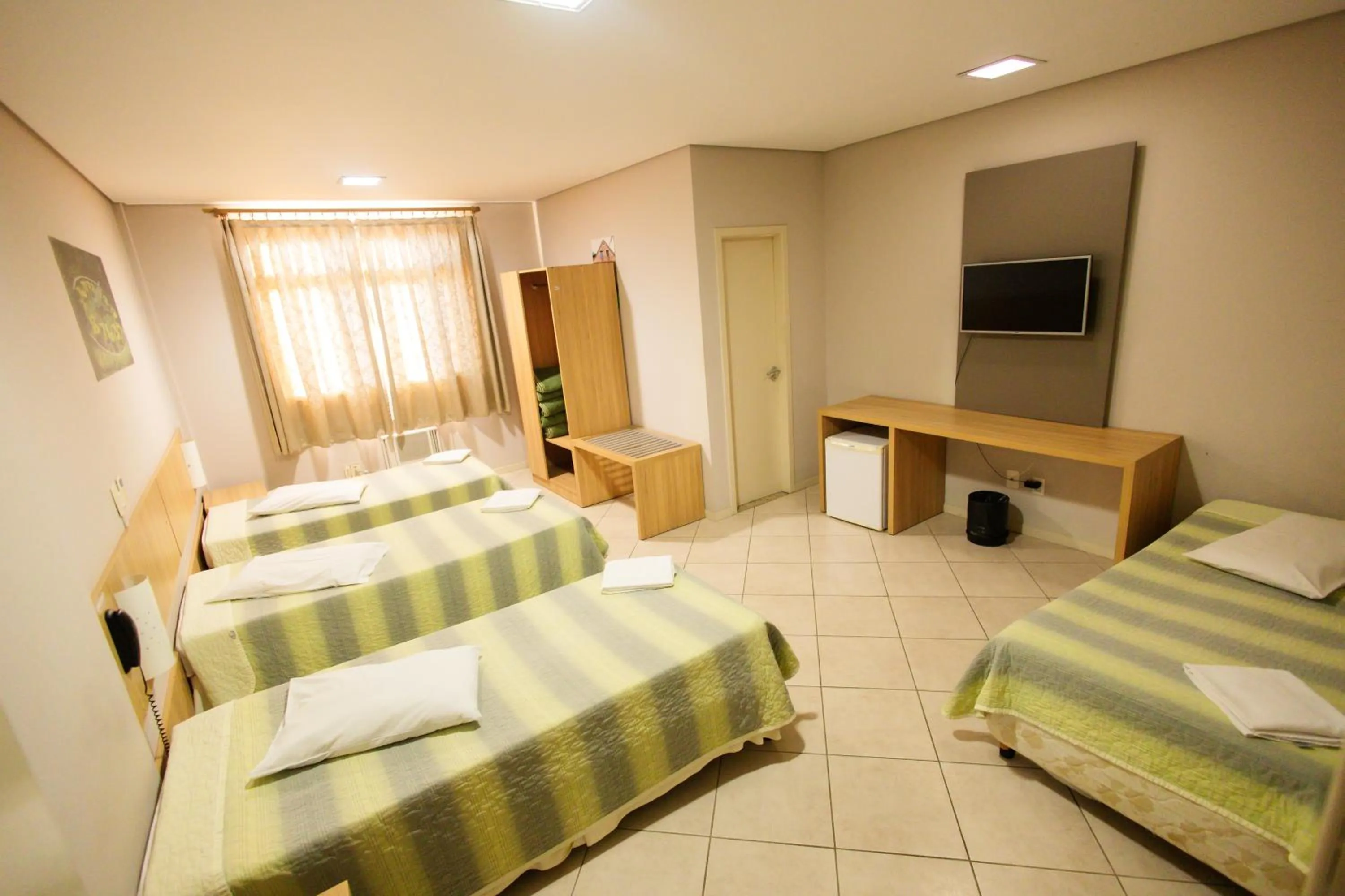 Bed in CHA Mime Hotel