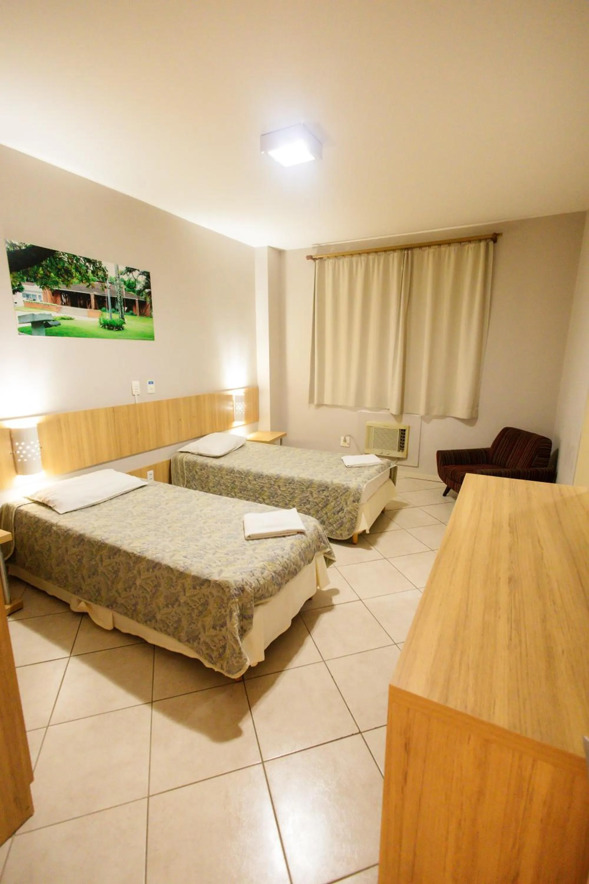 Bed in CHA Mime Hotel