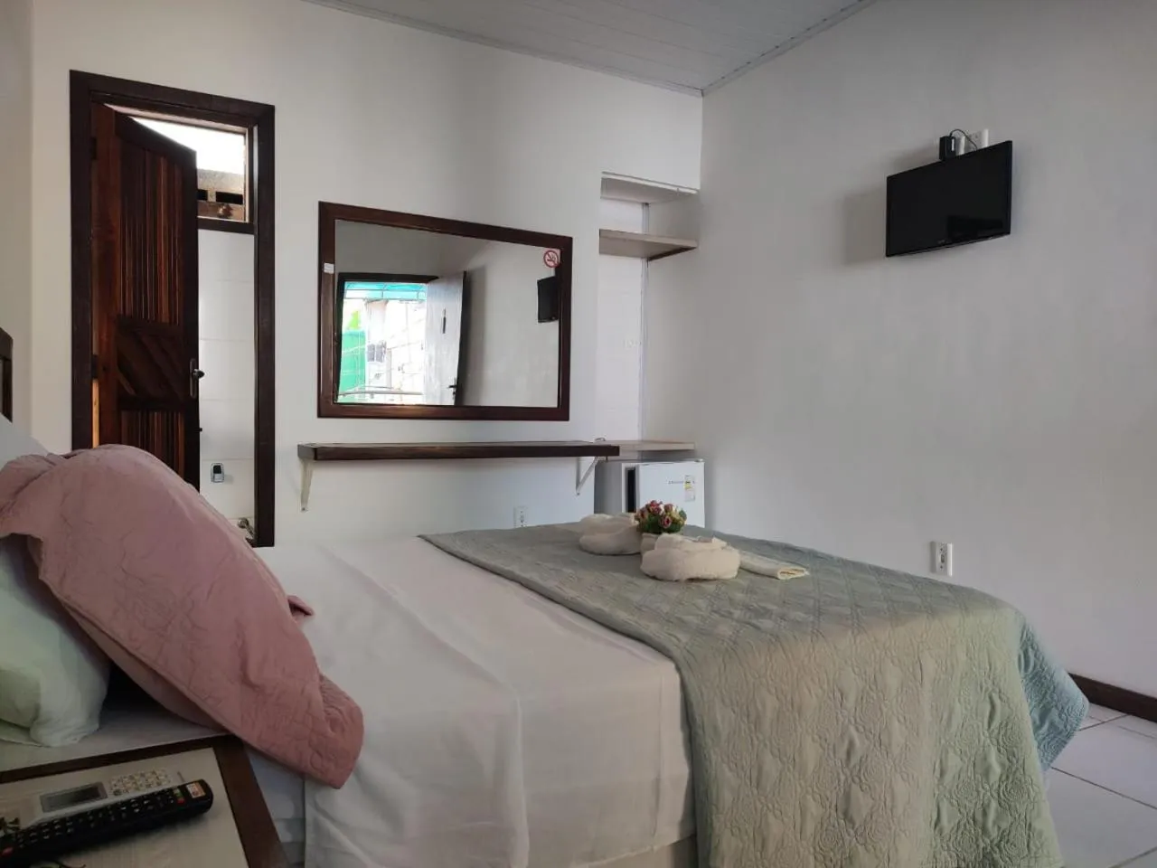 Bed in Pousada Camburi Star