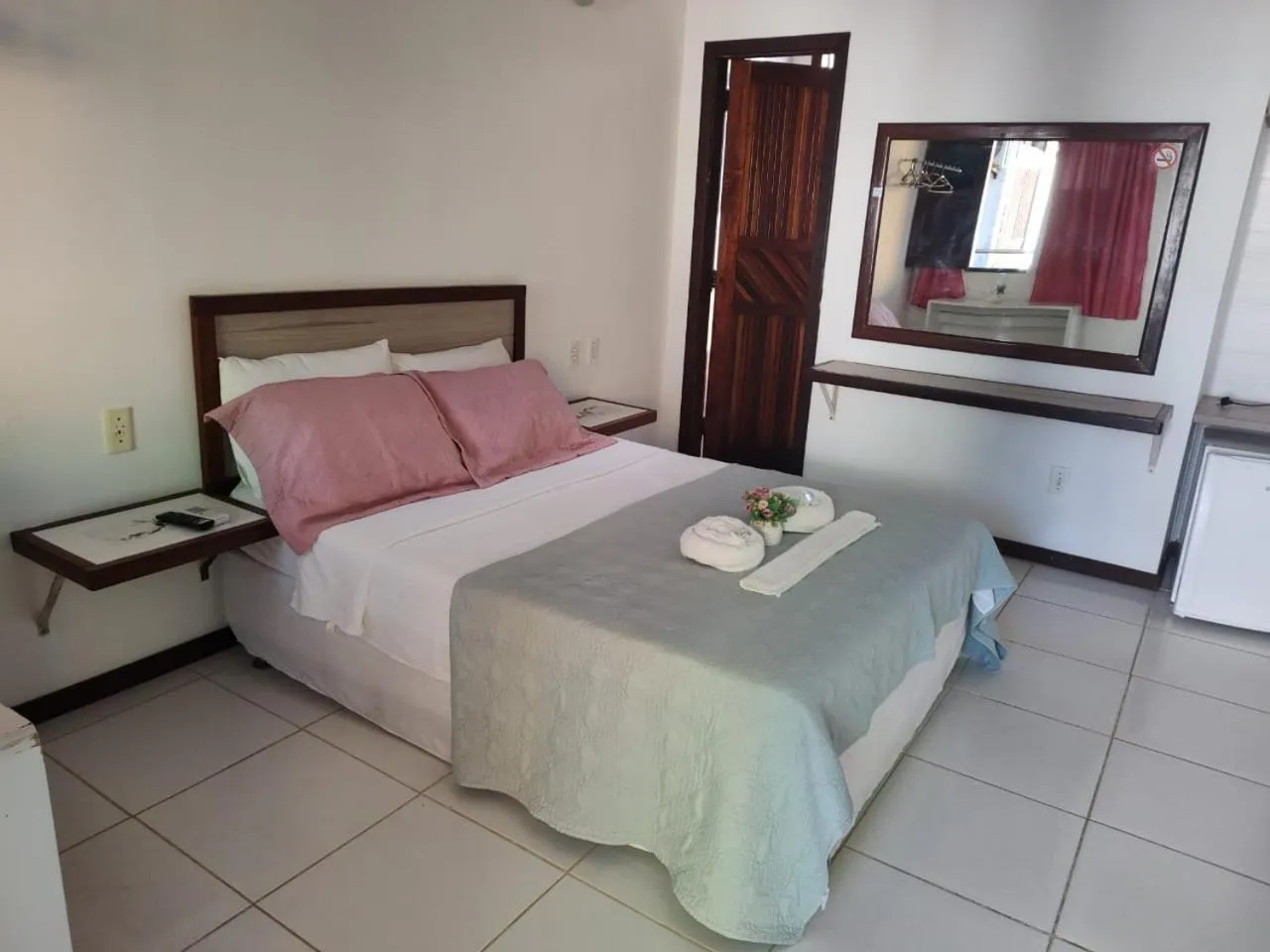 Bed in Pousada Camburi Star