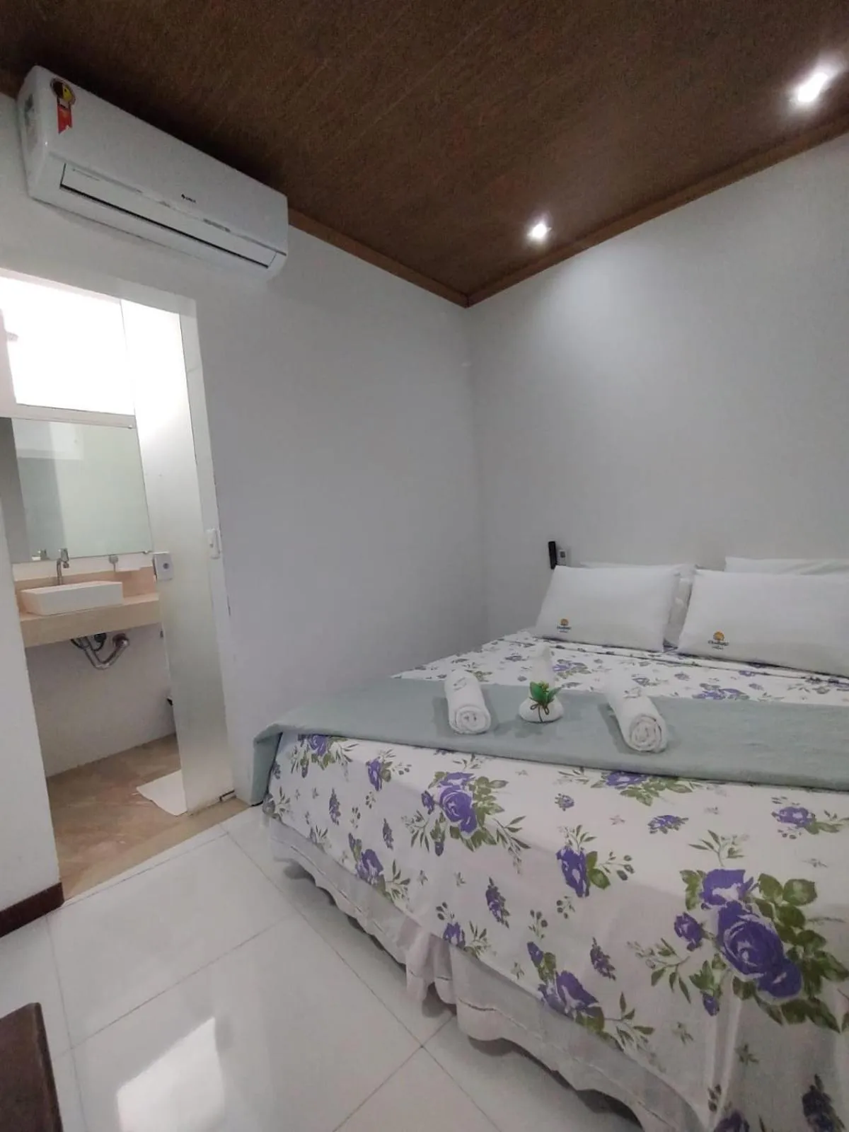 Bed in Pousada Camburi Star